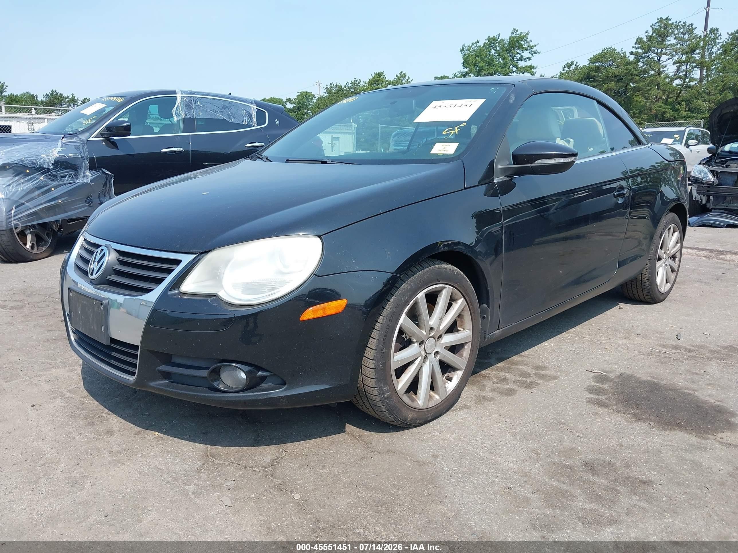 2010 Volkswagen Eos Komfort Black vin: WVWBA7AH8AV010105