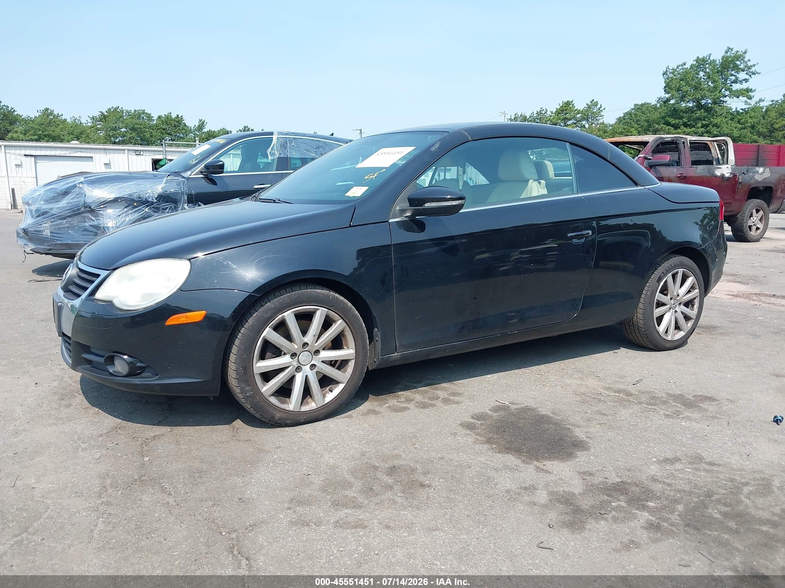 2010 Volkswagen Eos Komfort Black vin: WVWBA7AH8AV010105