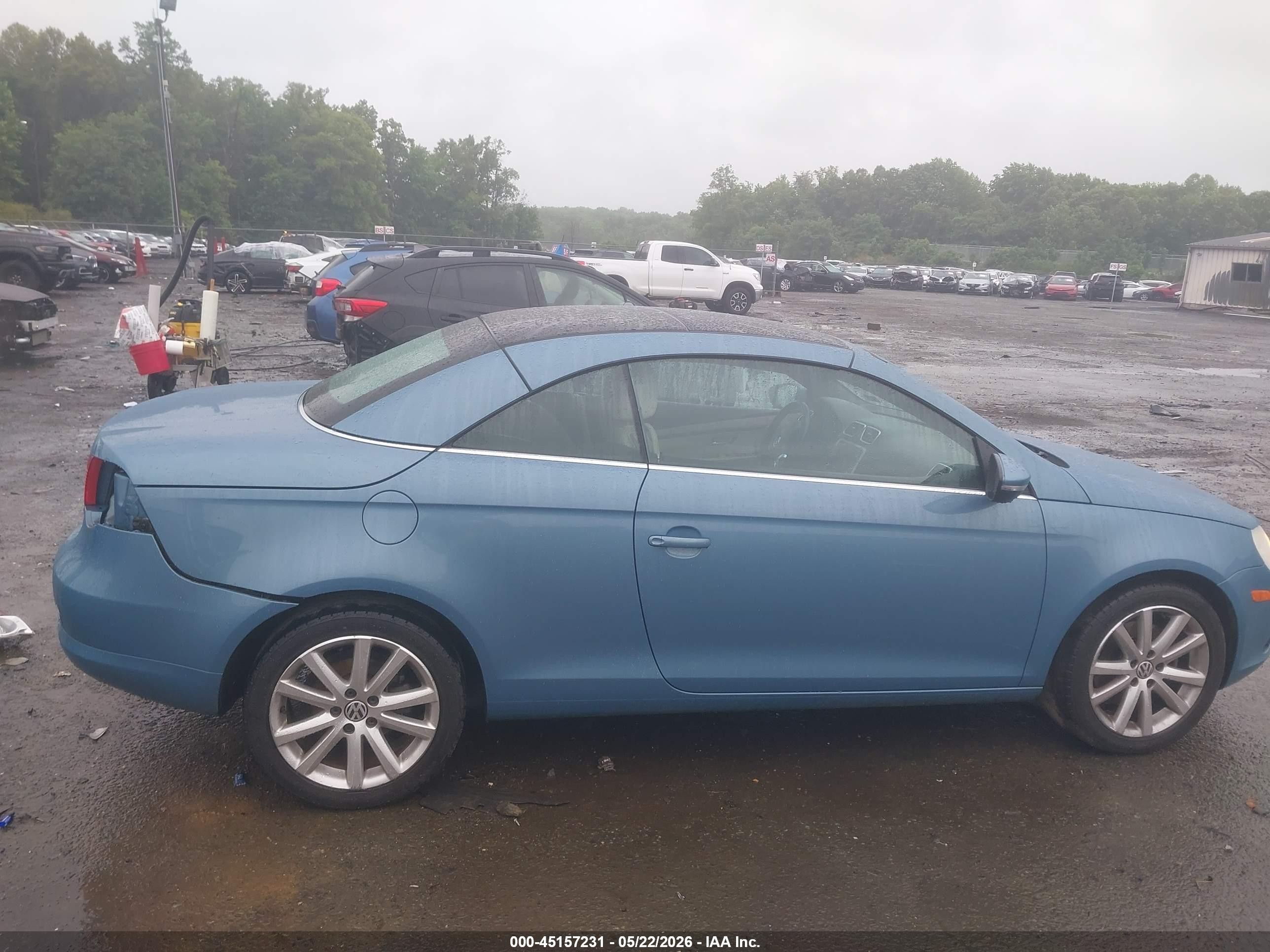 2010 Volkswagen Eos Komfort Light Blue vin: WVWBA7AH9AV020352