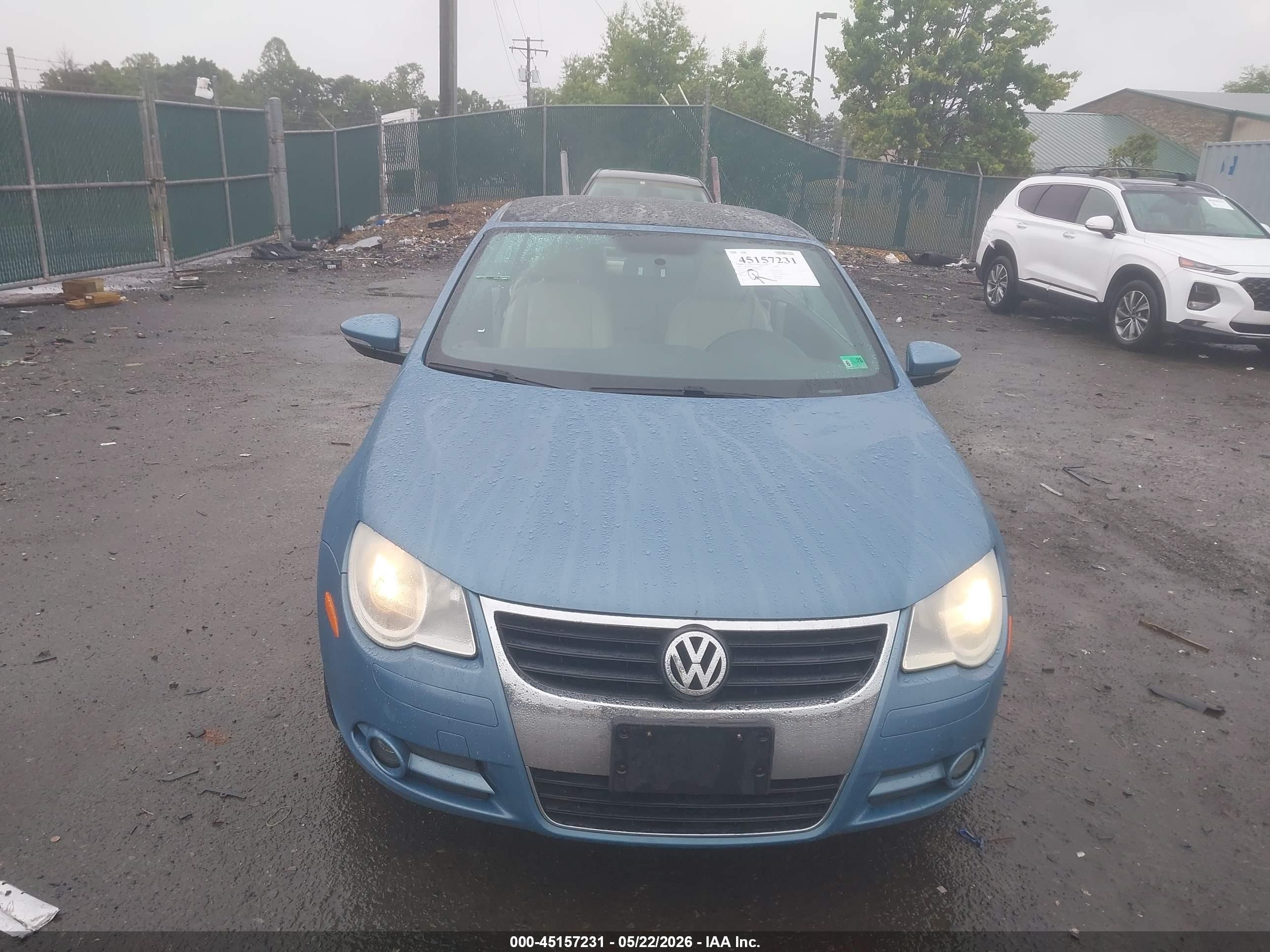 2010 Volkswagen Eos Komfort Light Blue vin: WVWBA7AH9AV020352