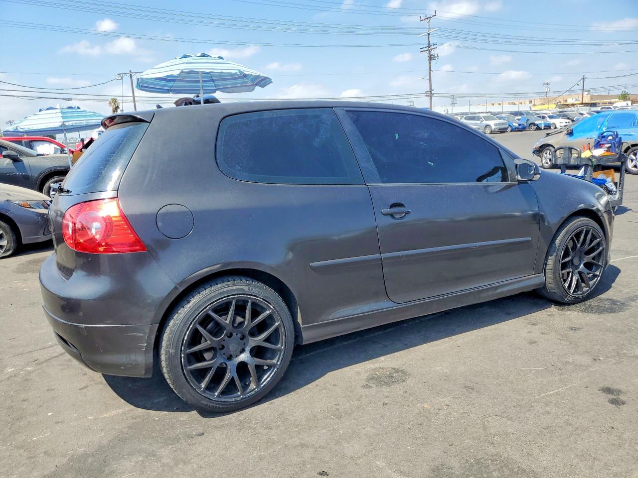 2009 Volkswagen Rabbit Black vin: WVWBB71K19W038276