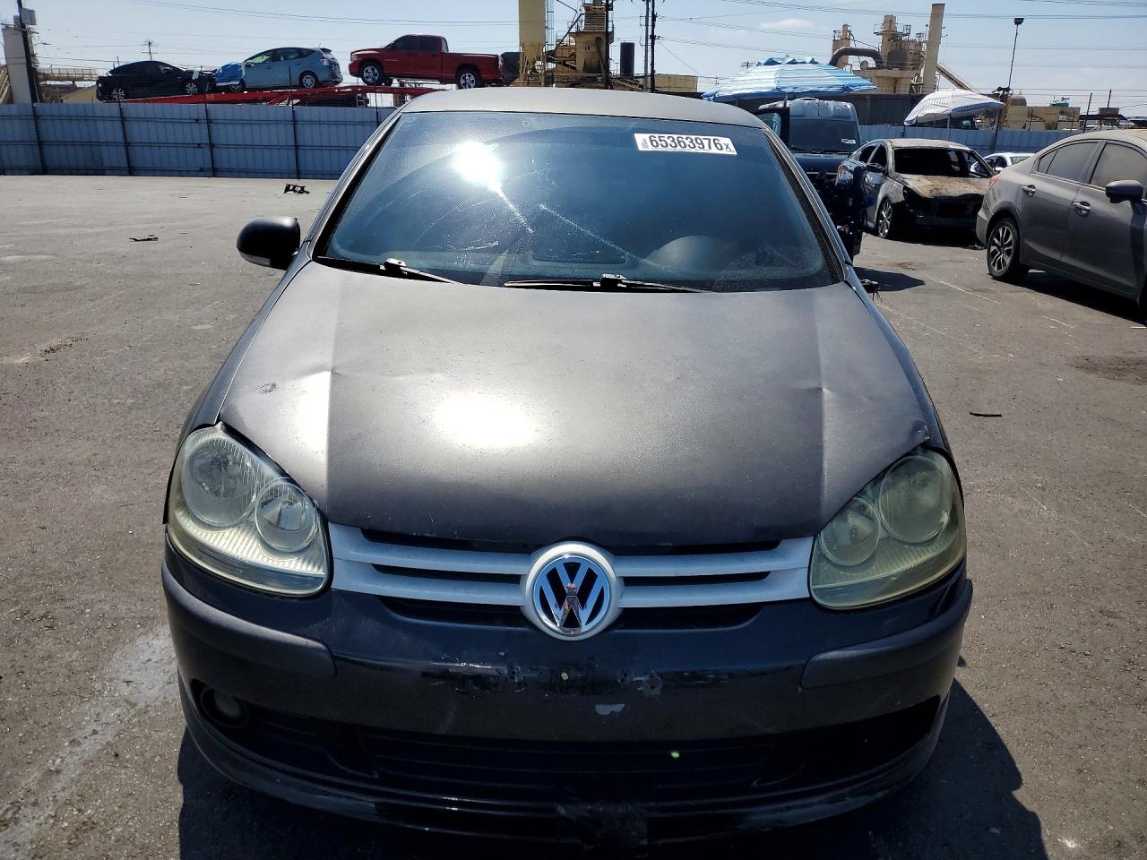 2009 Volkswagen Rabbit Black vin: WVWBB71K19W038276