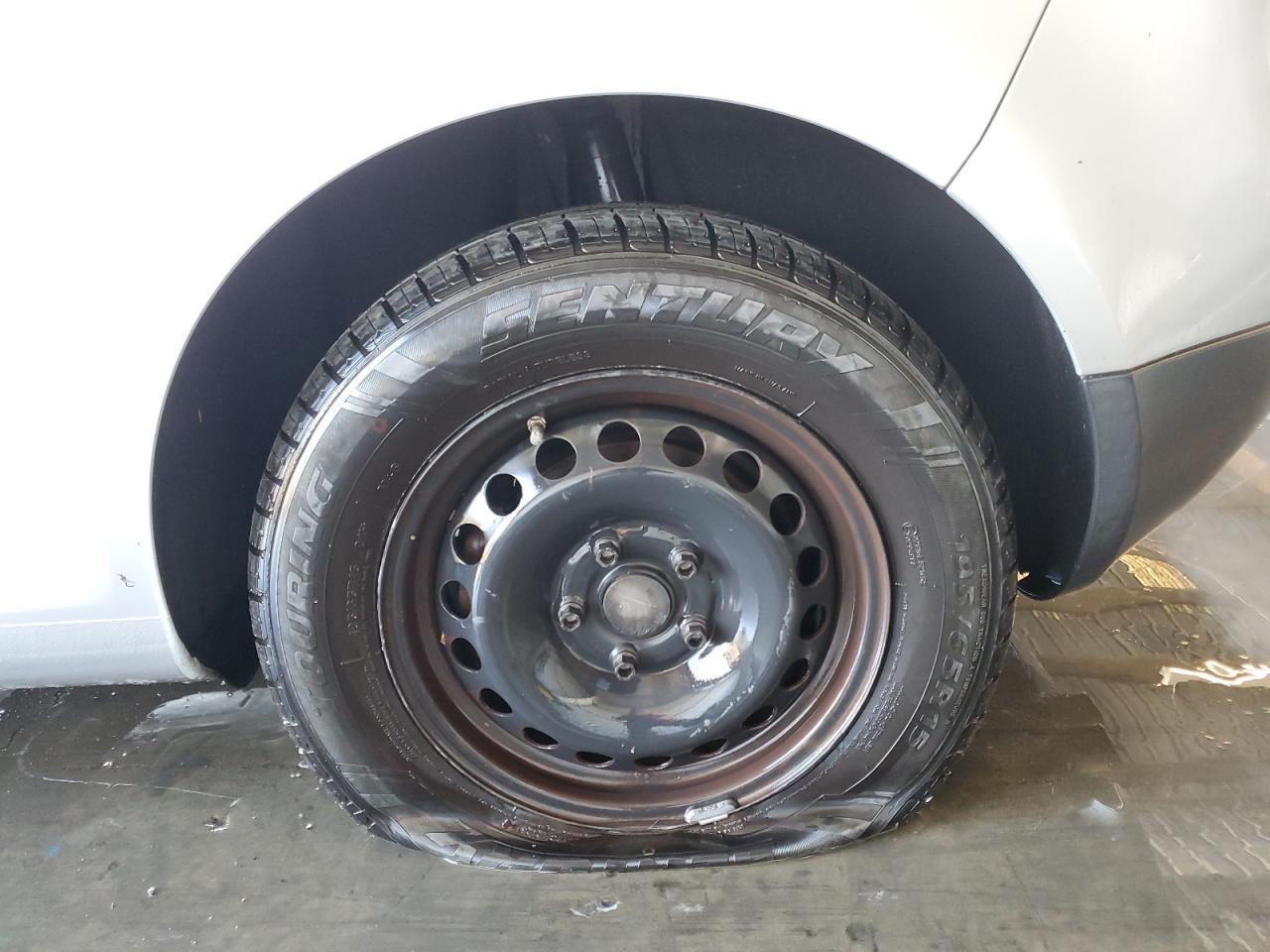 2008 Volkswagen Rabbit Silver vin: WVWBB71K38W270781 Damage: Left Rear Wheel Cover, Missing, Replacement Required