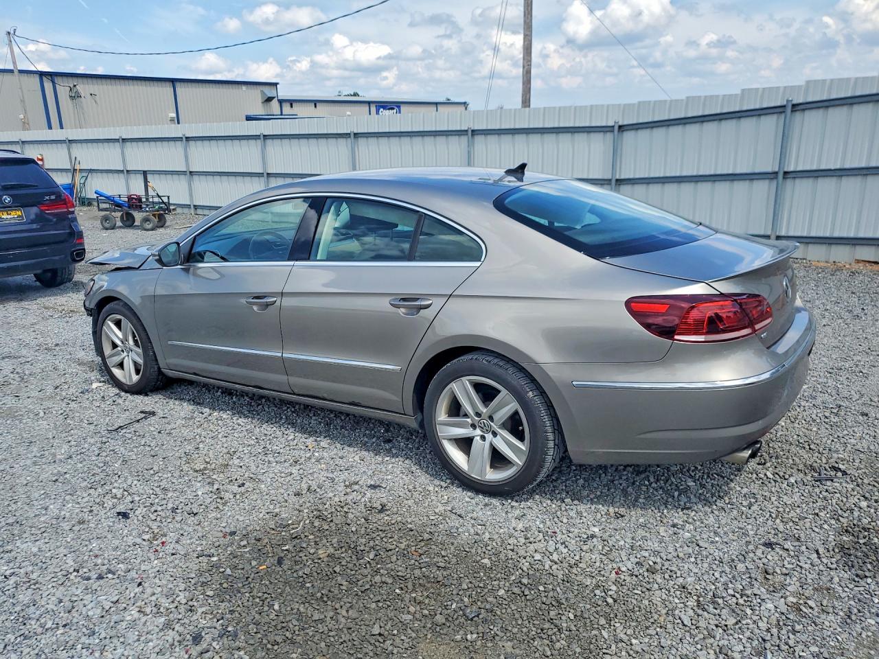 2014 Volkswagen Cc Sport Gold vin: WVWBN7AN6EE536636