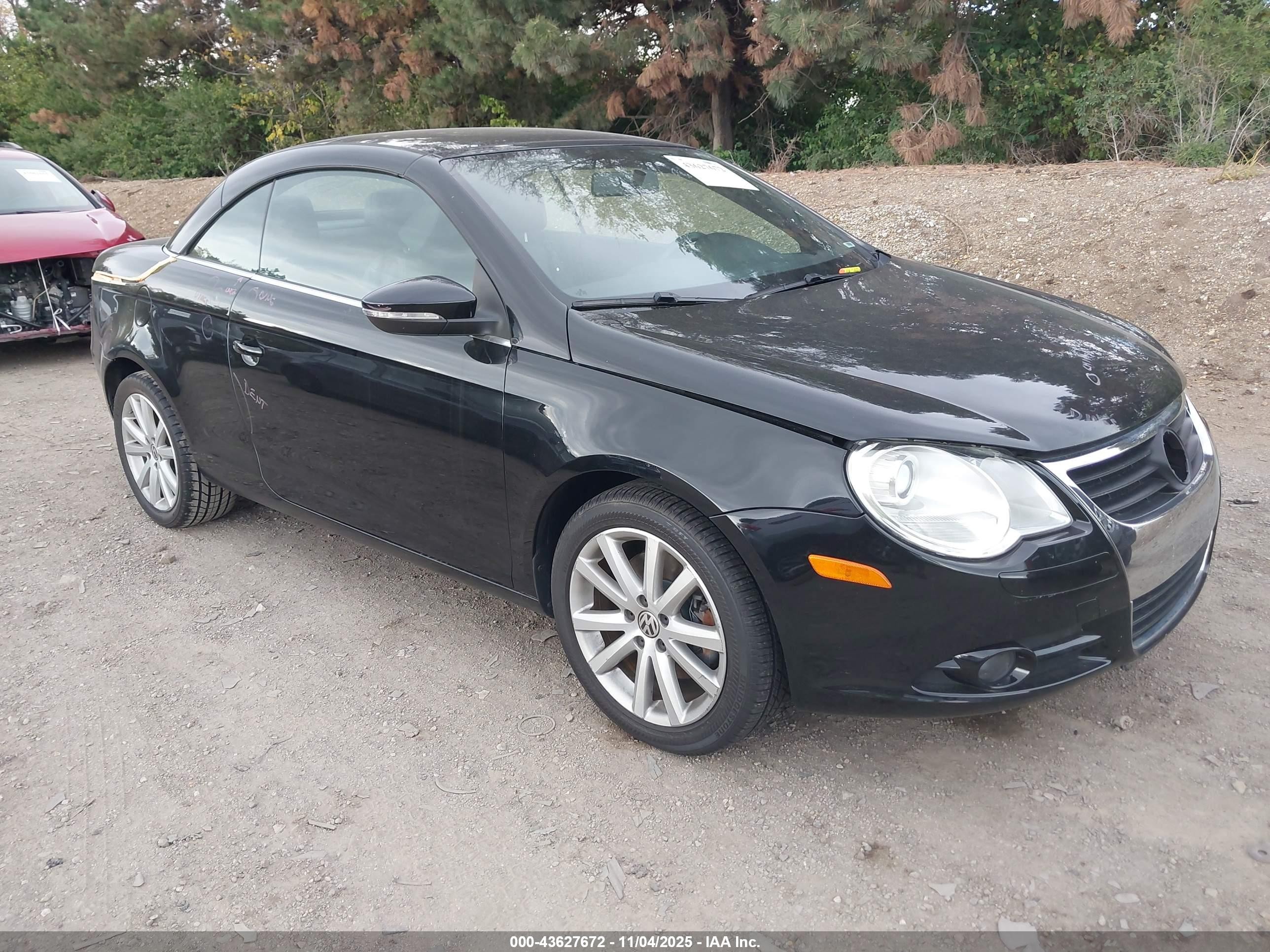2011 Volkswagen Eos Komfort Black vin: WVWBW7AH1BV004441
