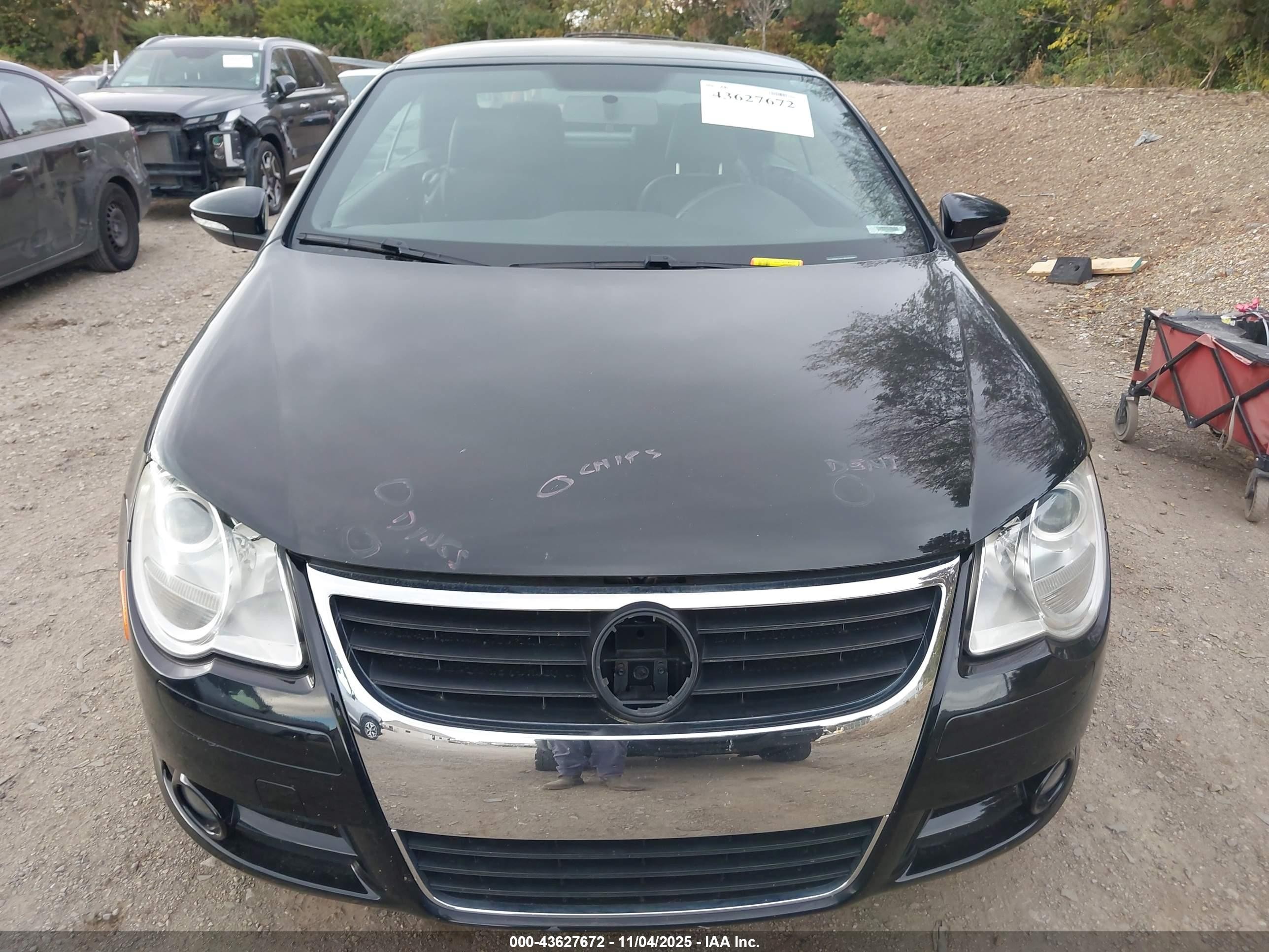 2011 Volkswagen Eos Komfort Black vin: WVWBW7AH1BV004441
