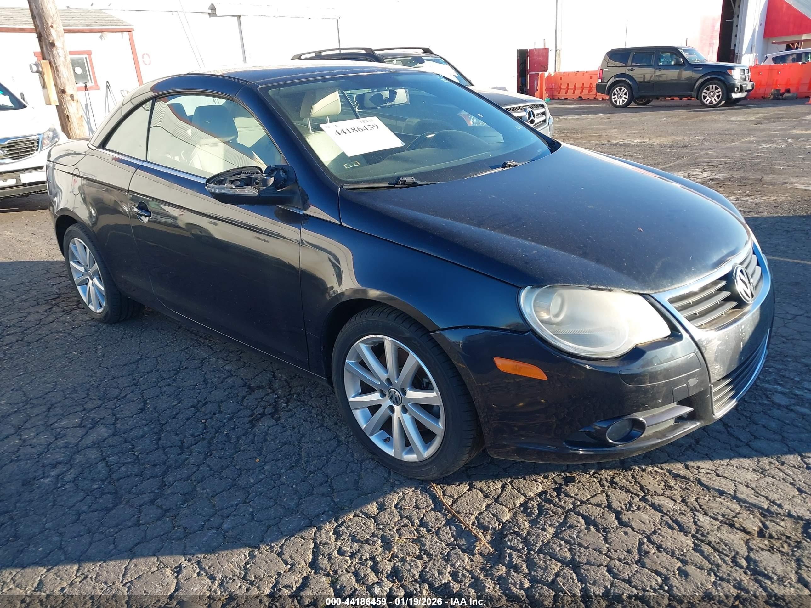 2011 Volkswagen Eos Komfort Black vin: WVWBW7AH2BV004528