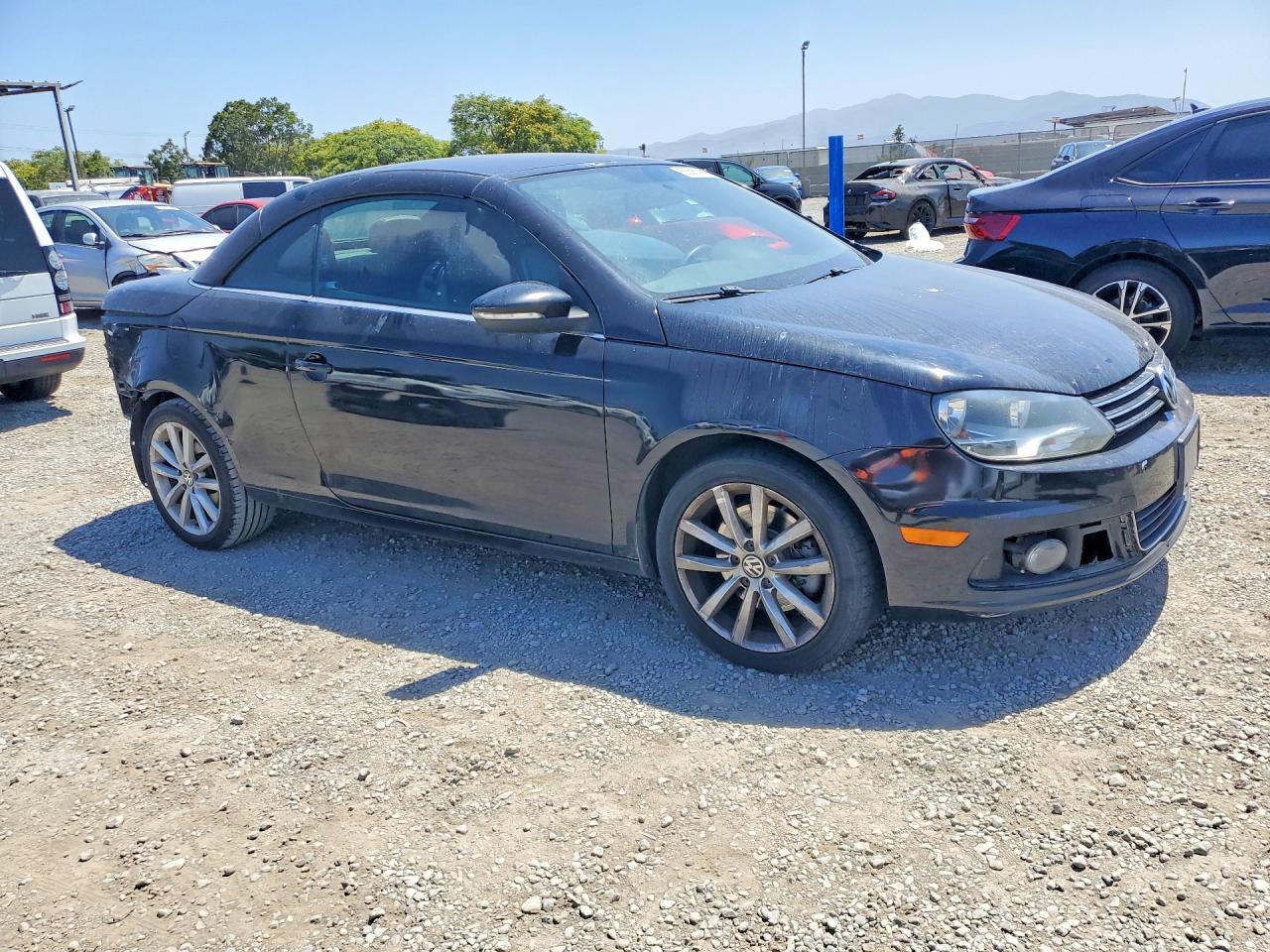 2012 Volkswagen Eos Komfort Black vin: WVWBW7AH4CV018948