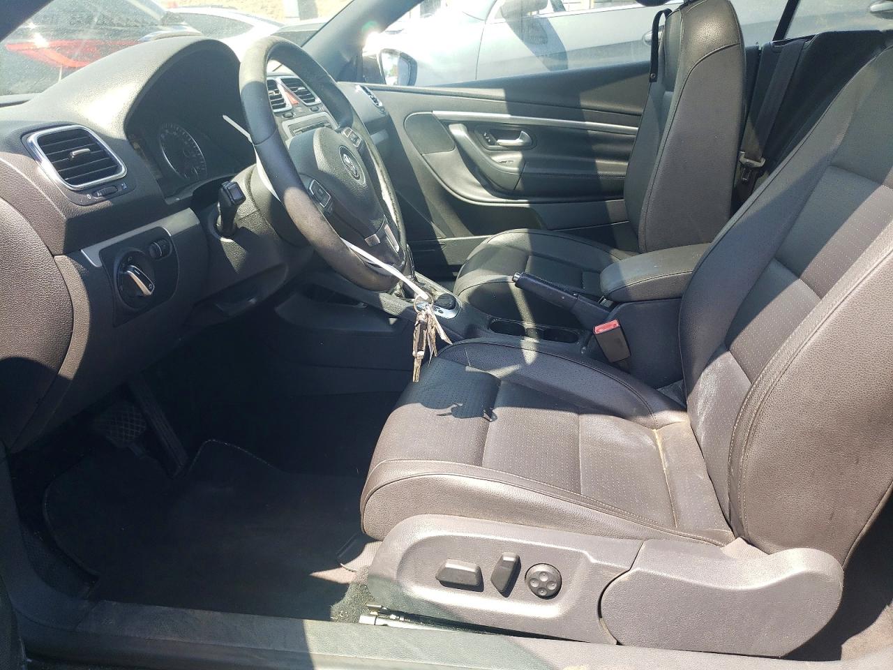 2012 Volkswagen Eos Komfort Black vin: WVWBW7AH7CV012447