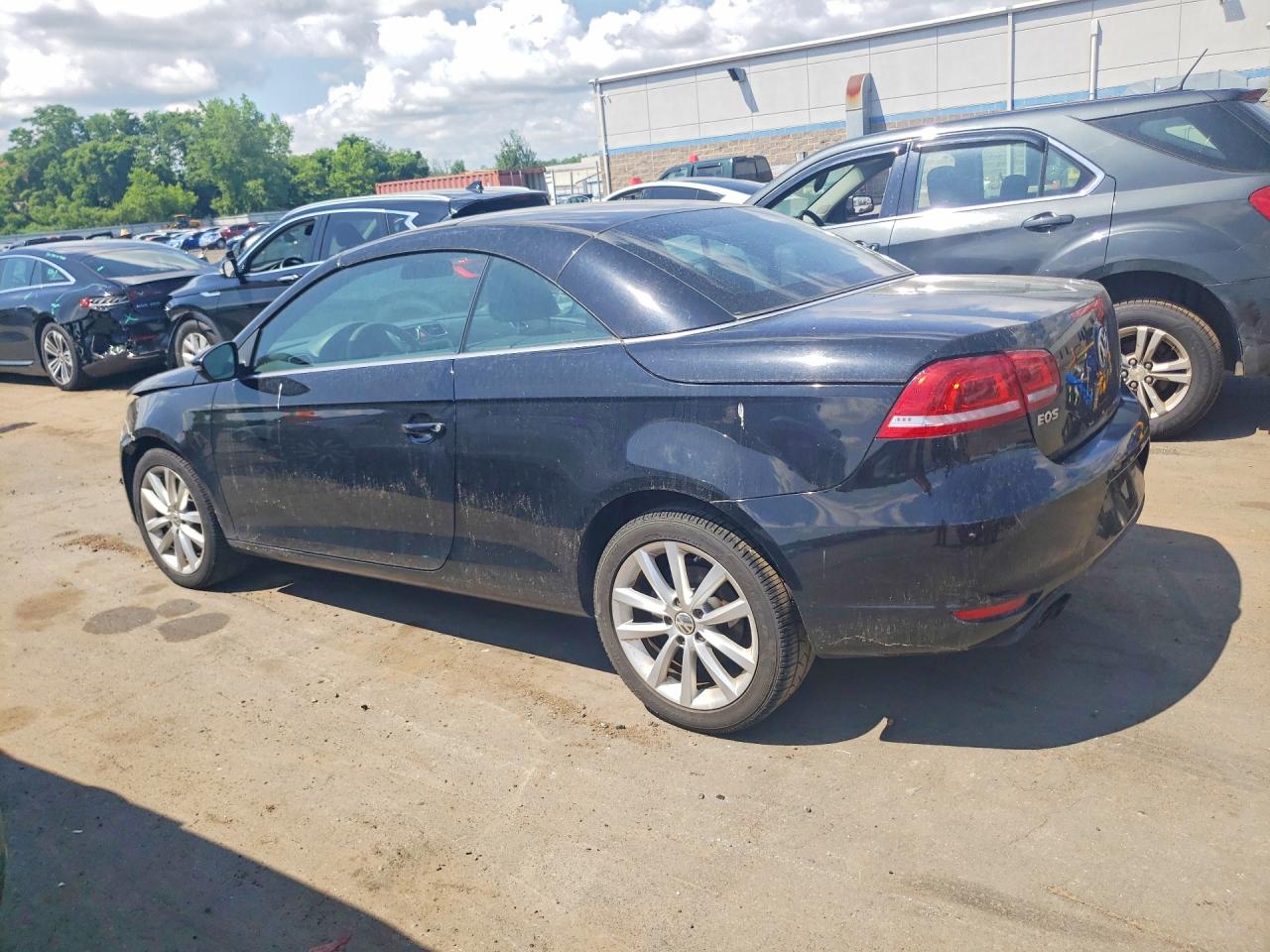 2012 Volkswagen Eos Komfort Black vin: WVWBW7AH7CV012447