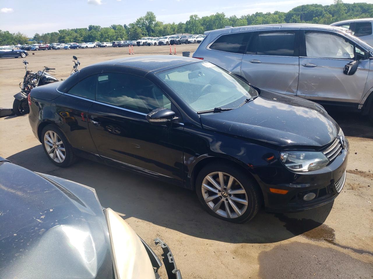 2012 Volkswagen Eos Komfort Black vin: WVWBW7AH7CV012447