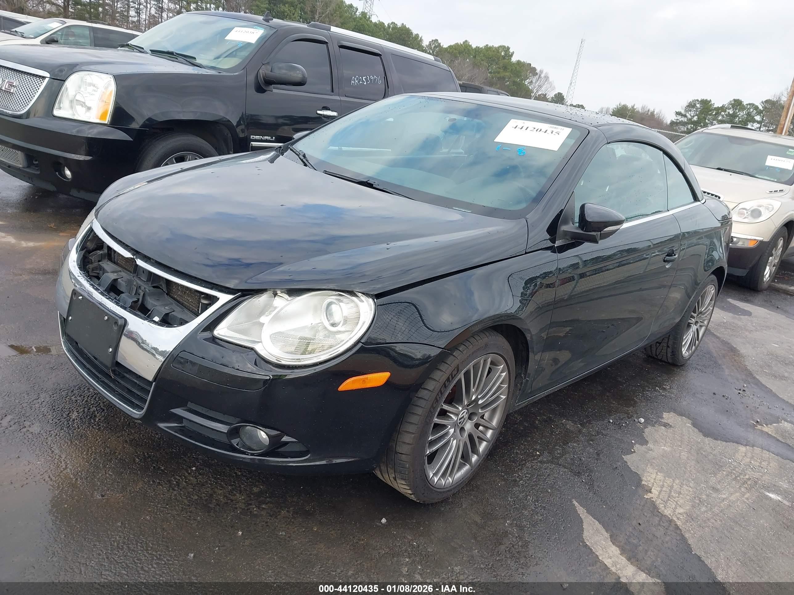 2011 Volkswagen Eos Komfort Black vin: WVWBW7AH8BV003920
