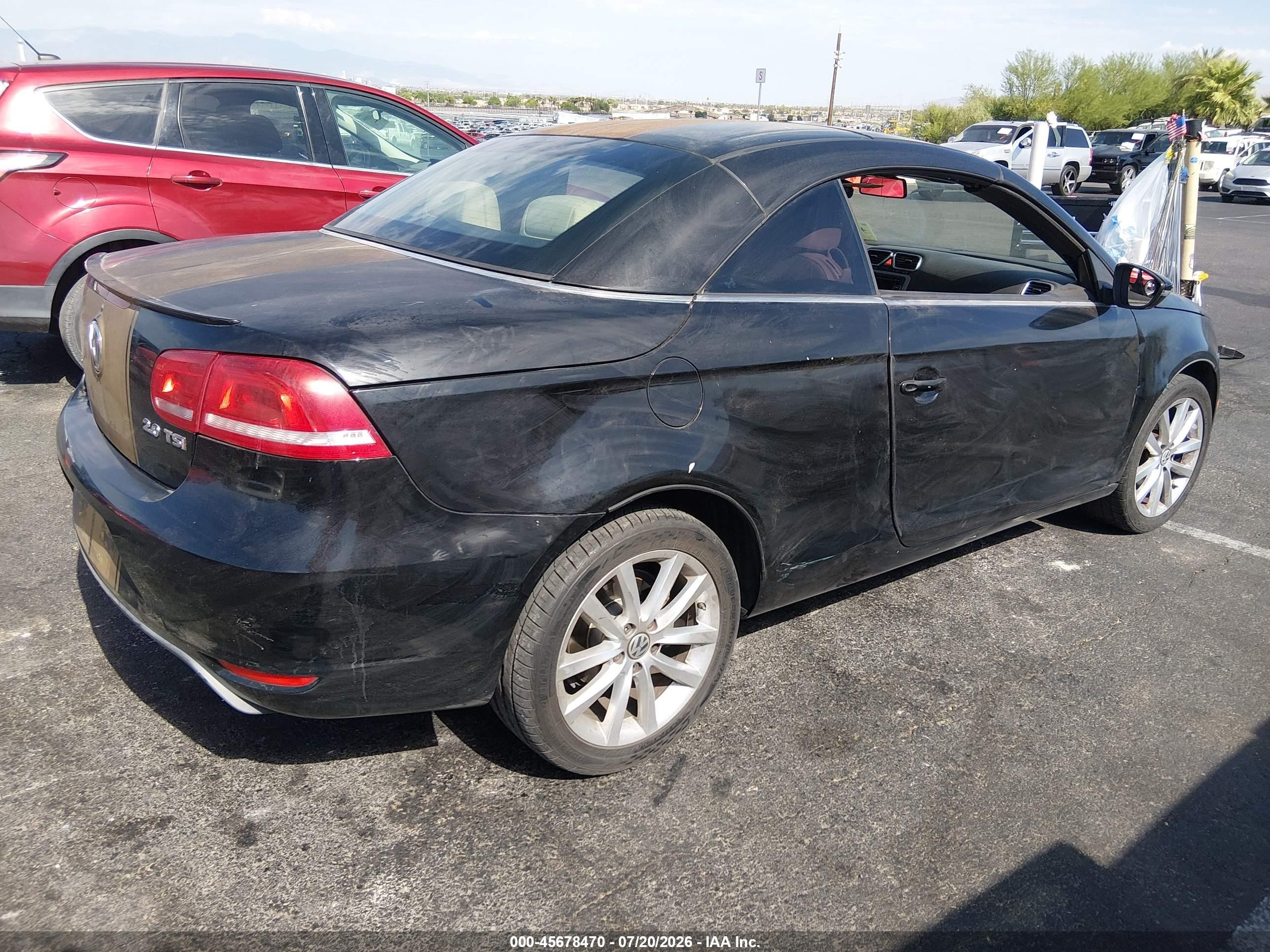 2012 Volkswagen Eos Komfort Черный vin: WVWBW7AH8CV020346