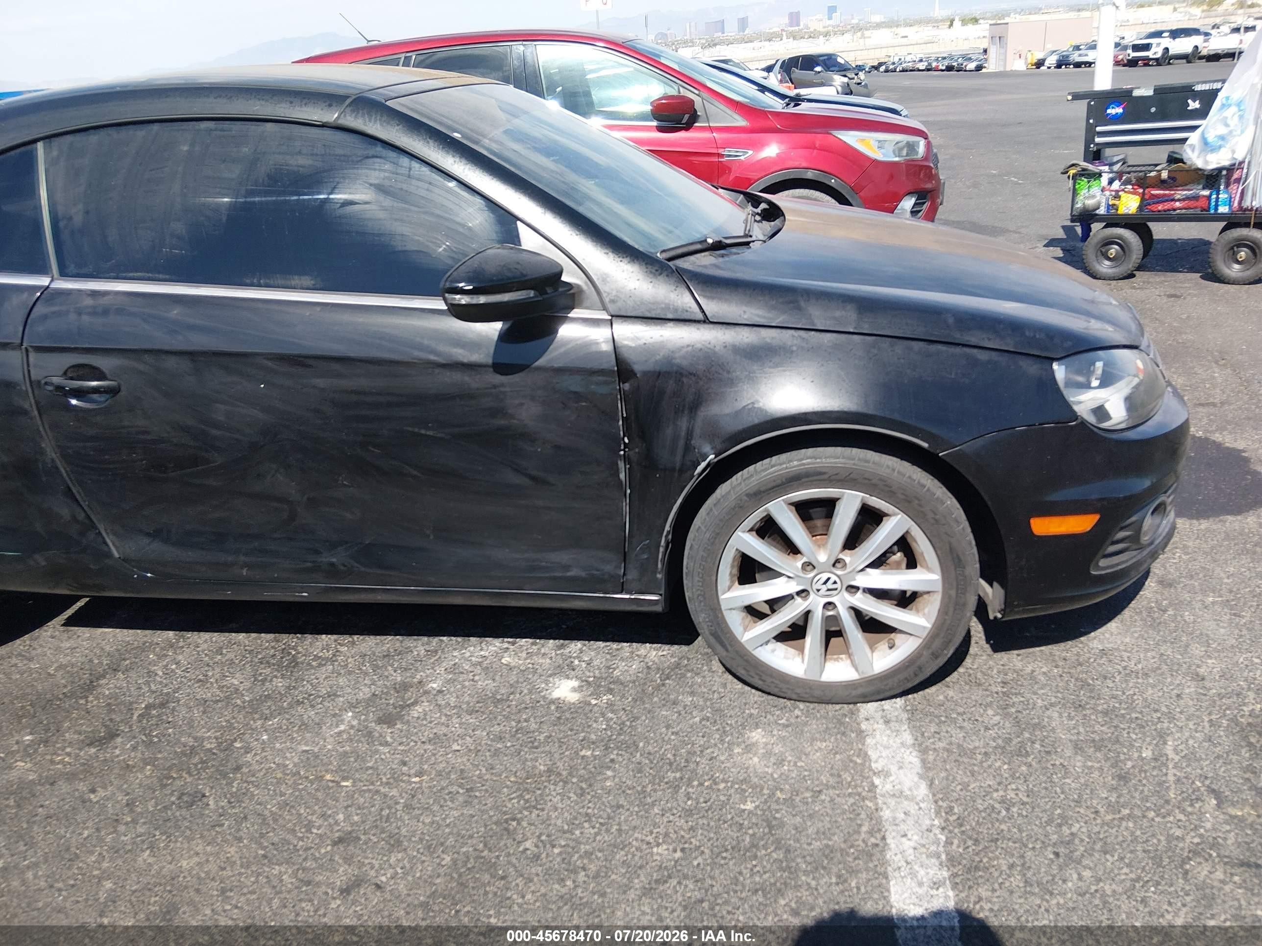 2012 Volkswagen Eos Komfort Черный vin: WVWBW7AH8CV020346