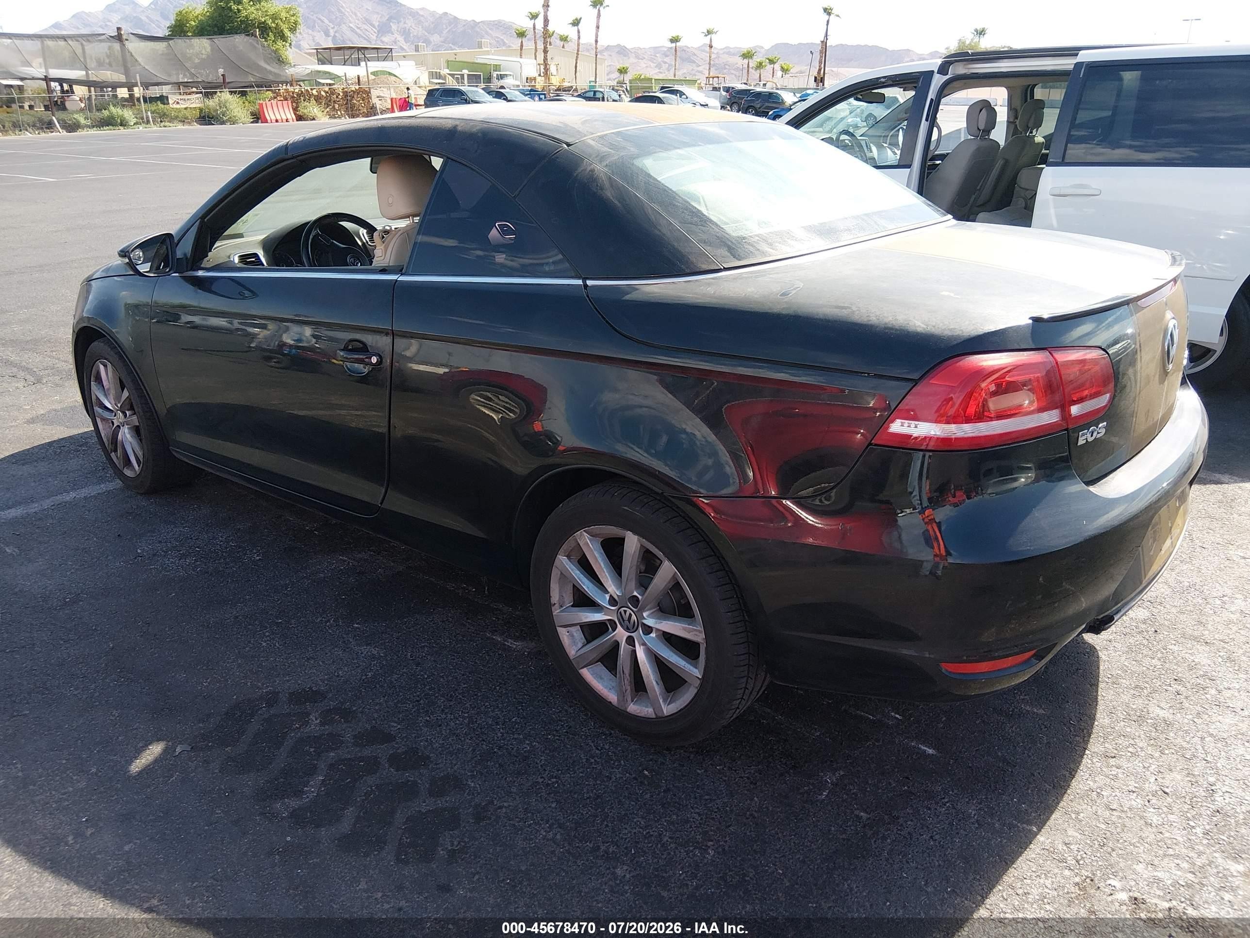 2012 Volkswagen Eos Komfort Черный vin: WVWBW7AH8CV020346