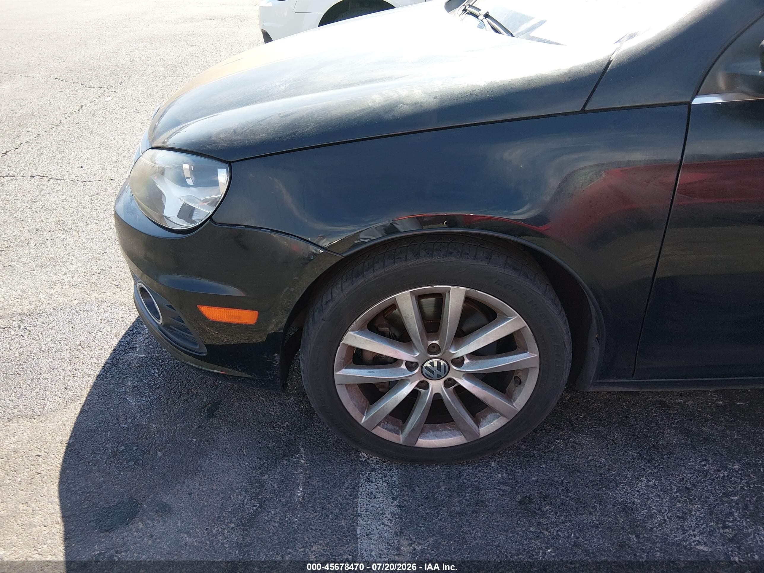 2012 Volkswagen Eos Komfort Черный vin: WVWBW7AH8CV020346