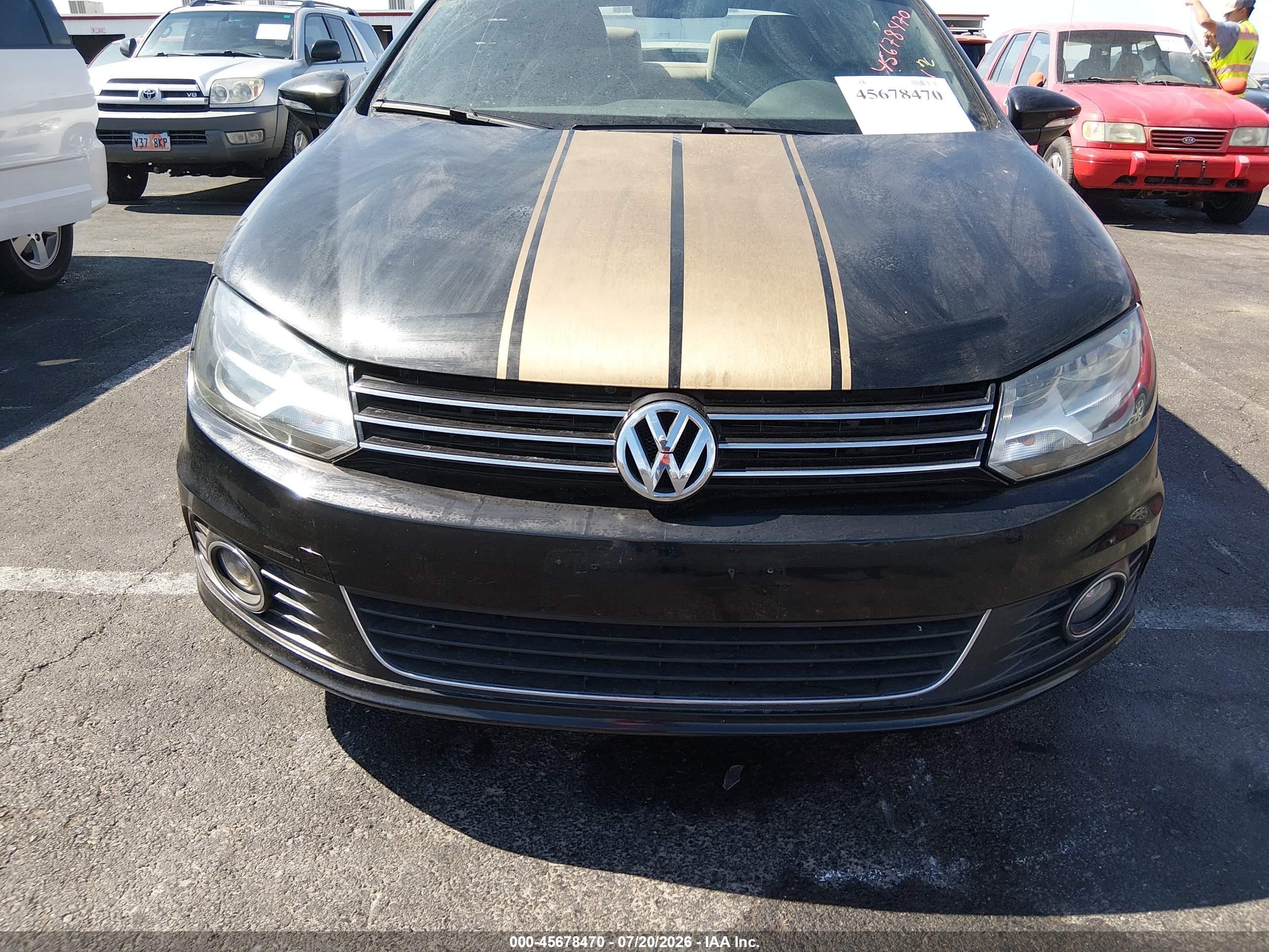 2012 Volkswagen Eos Komfort Черный vin: WVWBW7AH8CV020346