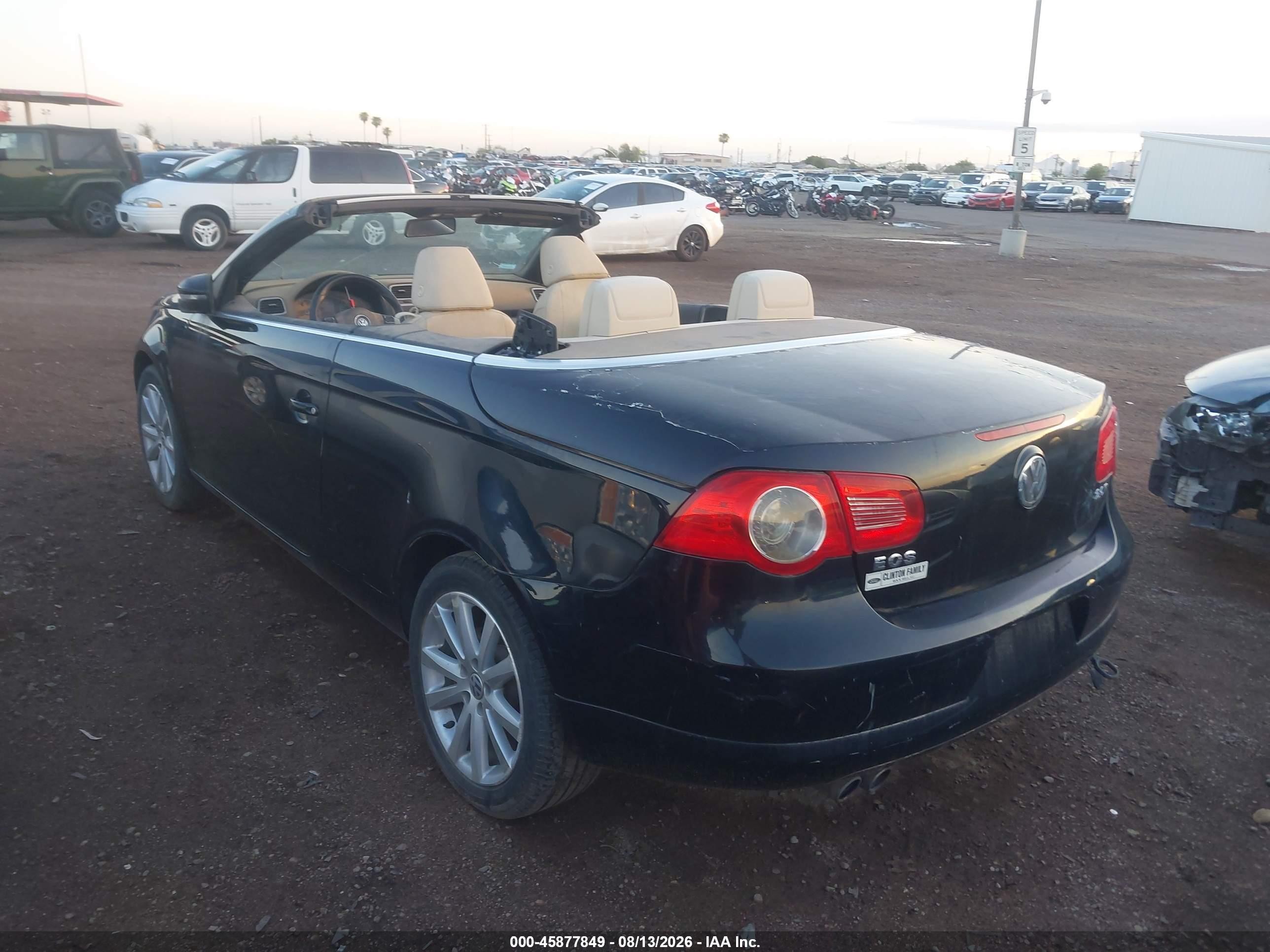 2011 Volkswagen Eos Komfort Black vin: WVWBW7AH9BV004686