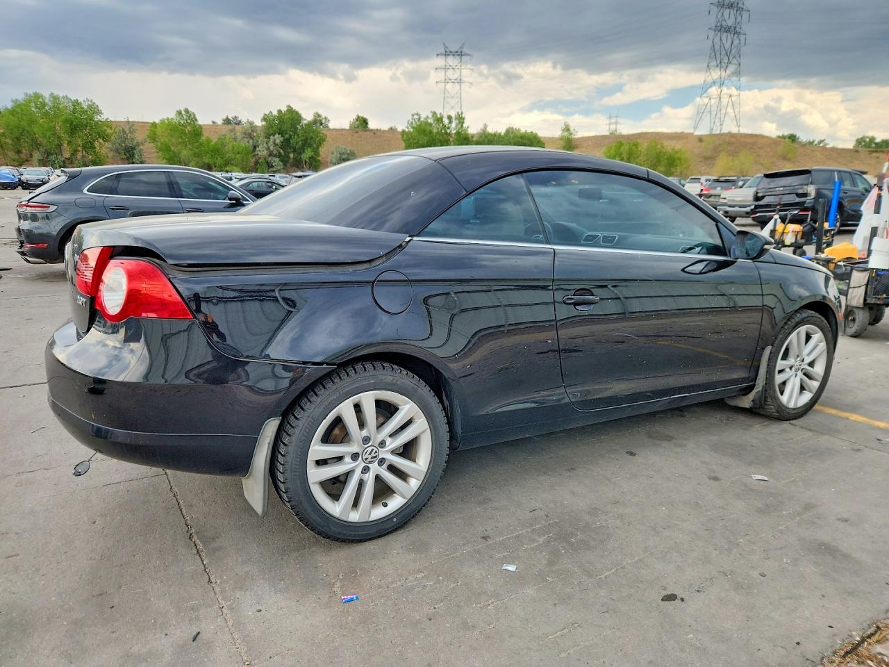 2011 Volkswagen Eos Komfort Черный vin: WVWBW7AH9BV005045