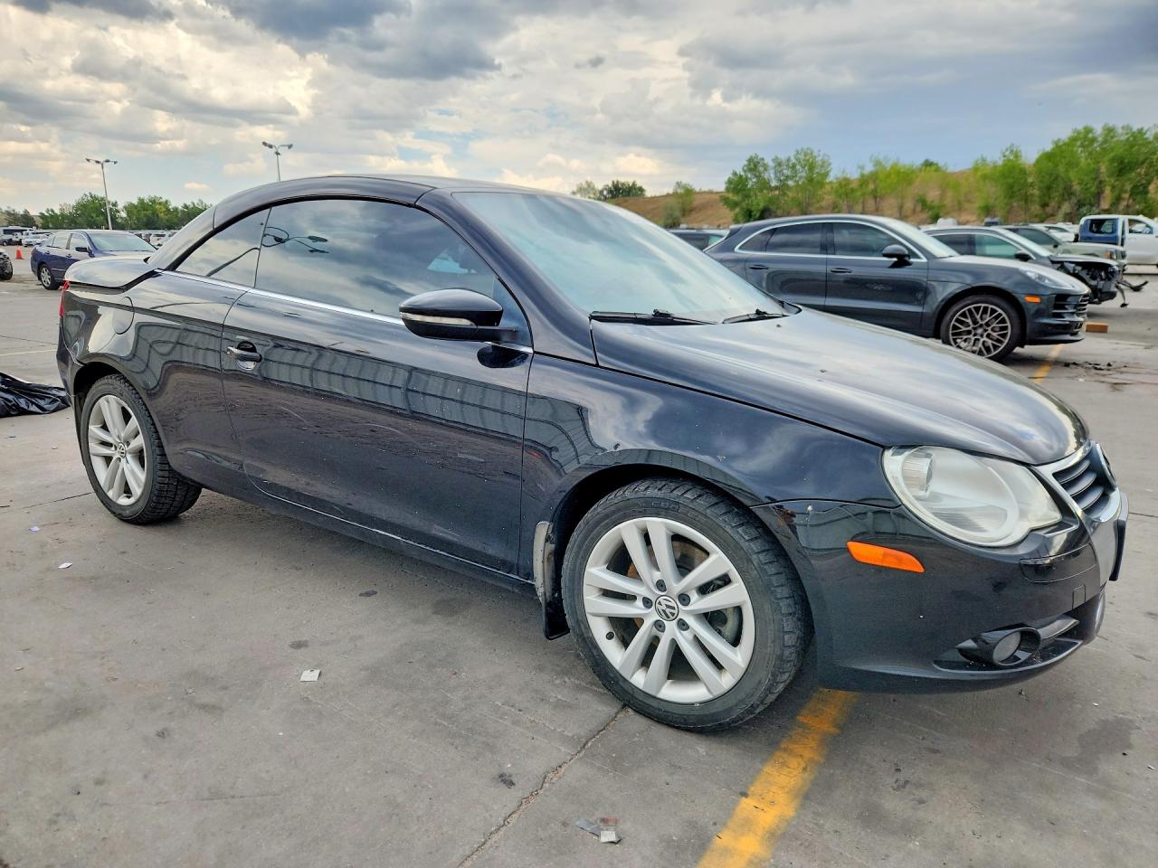 2011 Volkswagen Eos Komfort Черный vin: WVWBW7AH9BV005045