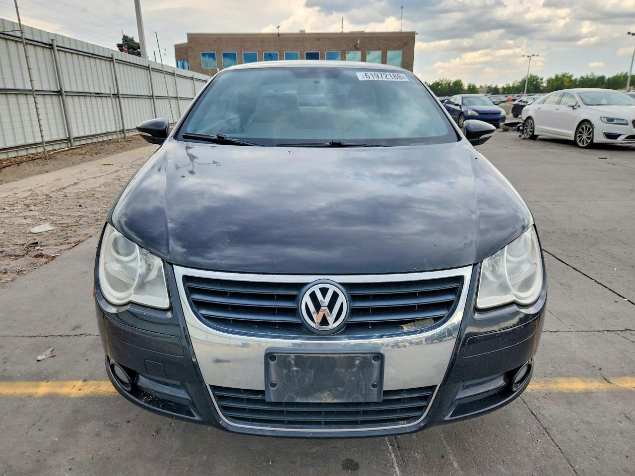 2011 Volkswagen Eos Komfort Черный vin: WVWBW7AH9BV005045