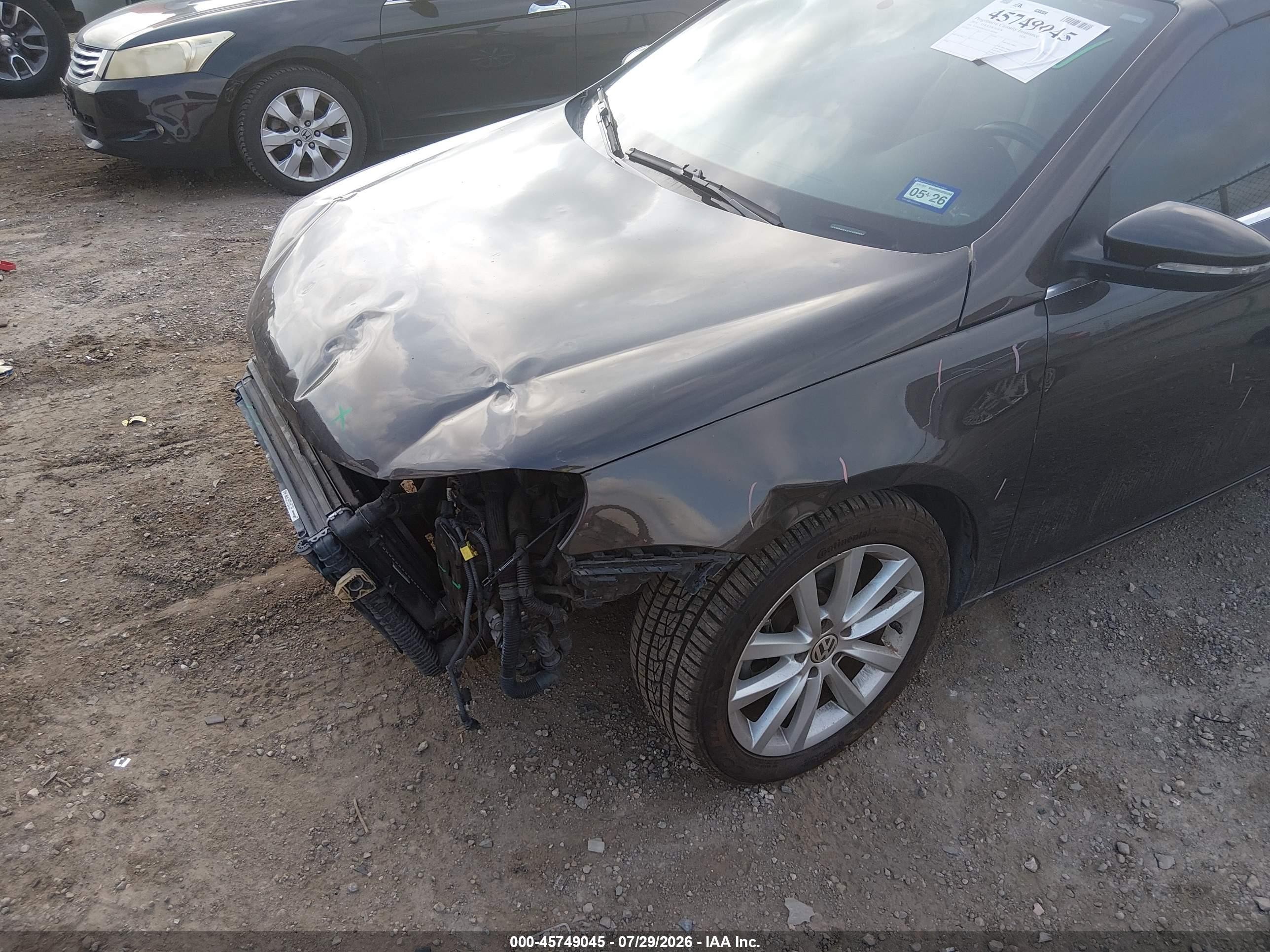 2014 Volkswagen Eos Komfort Коричневый vin: WVWBW8AH1EV000996