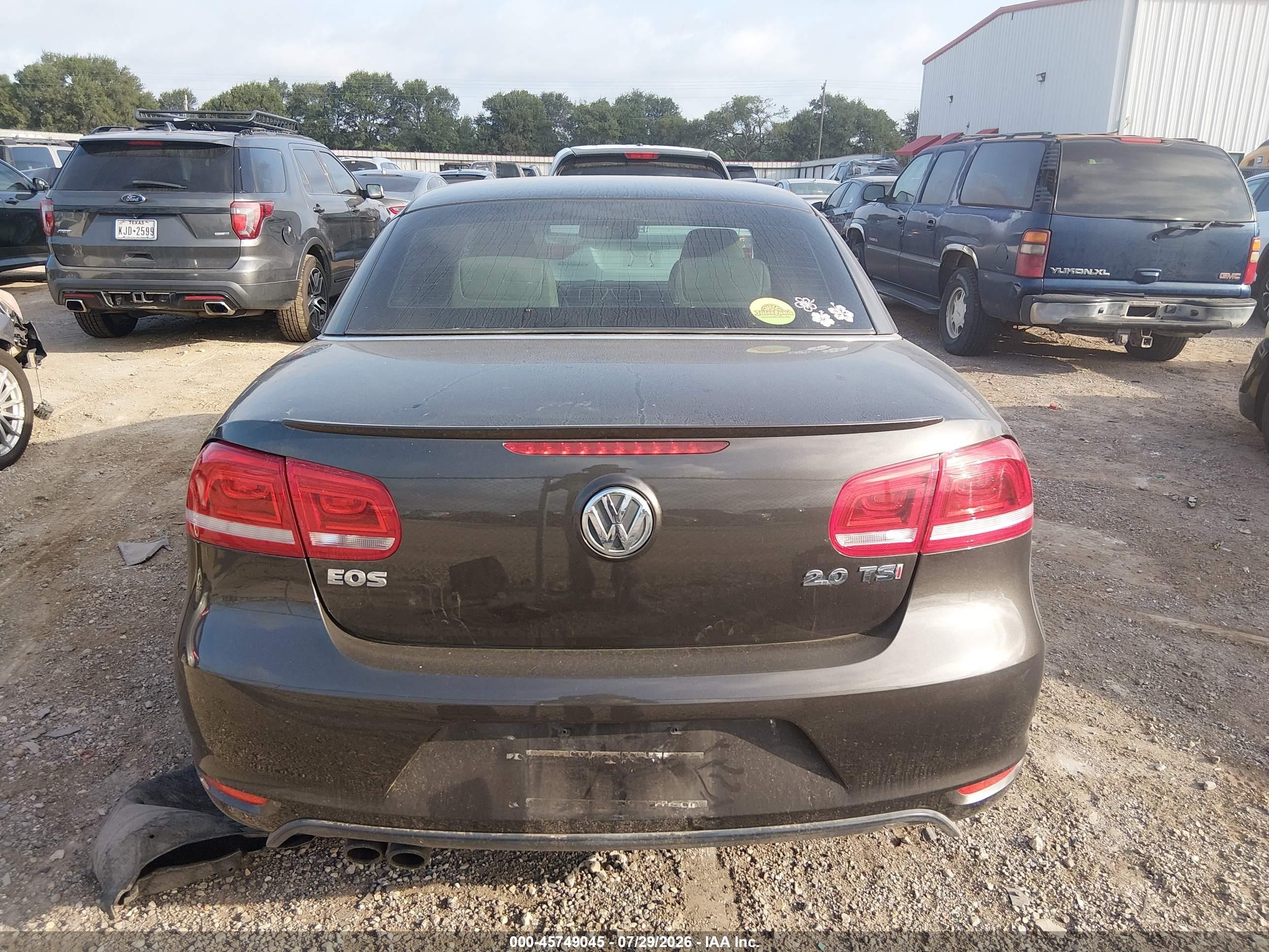 2014 Volkswagen Eos Komfort Коричневый vin: WVWBW8AH1EV000996