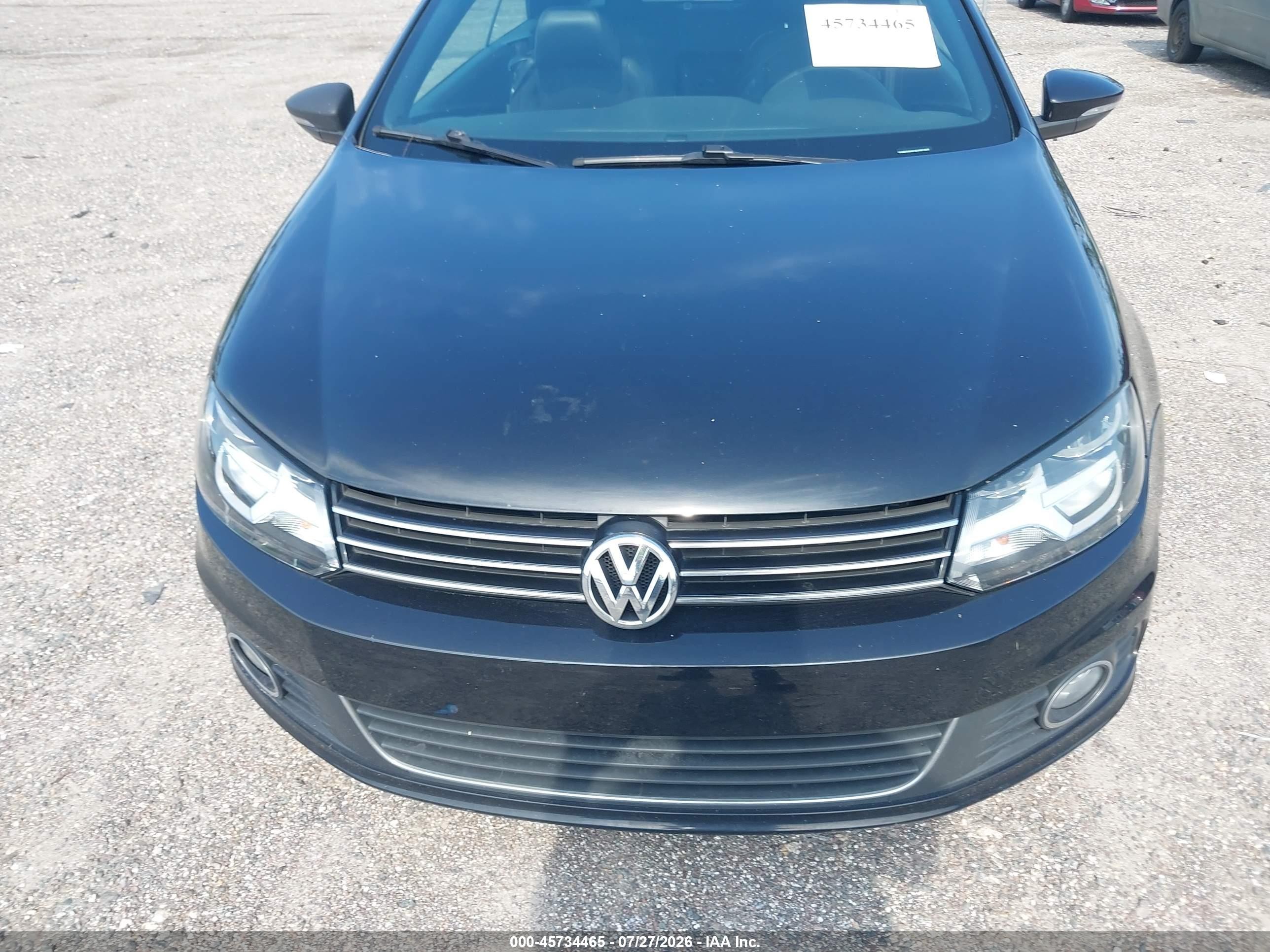 2014 Volkswagen Eos Komfort Черный vin: WVWBW8AH1EV001596