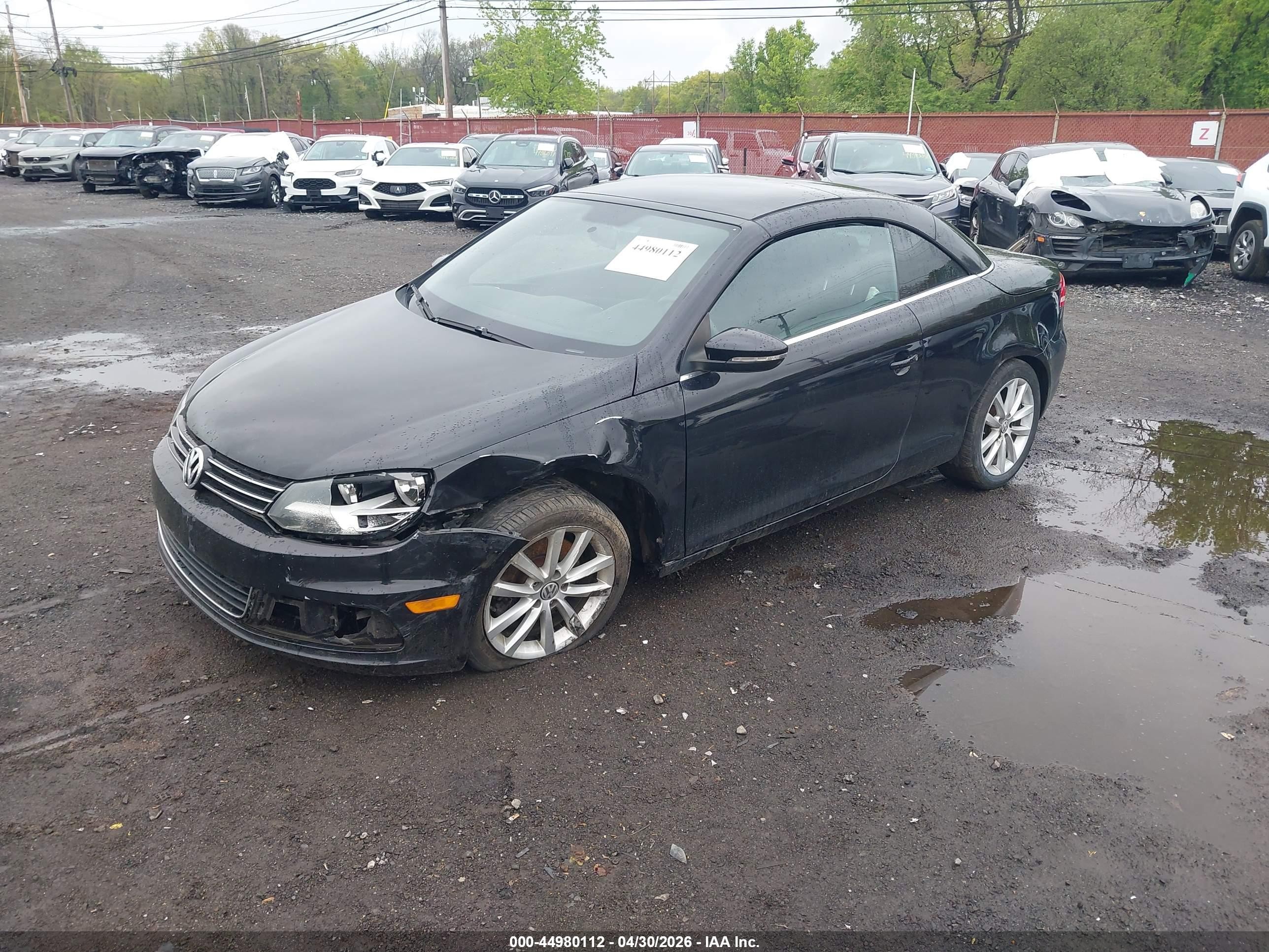 2013 Volkswagen Eos Komfort Черный vin: WVWBW8AH3DV009049