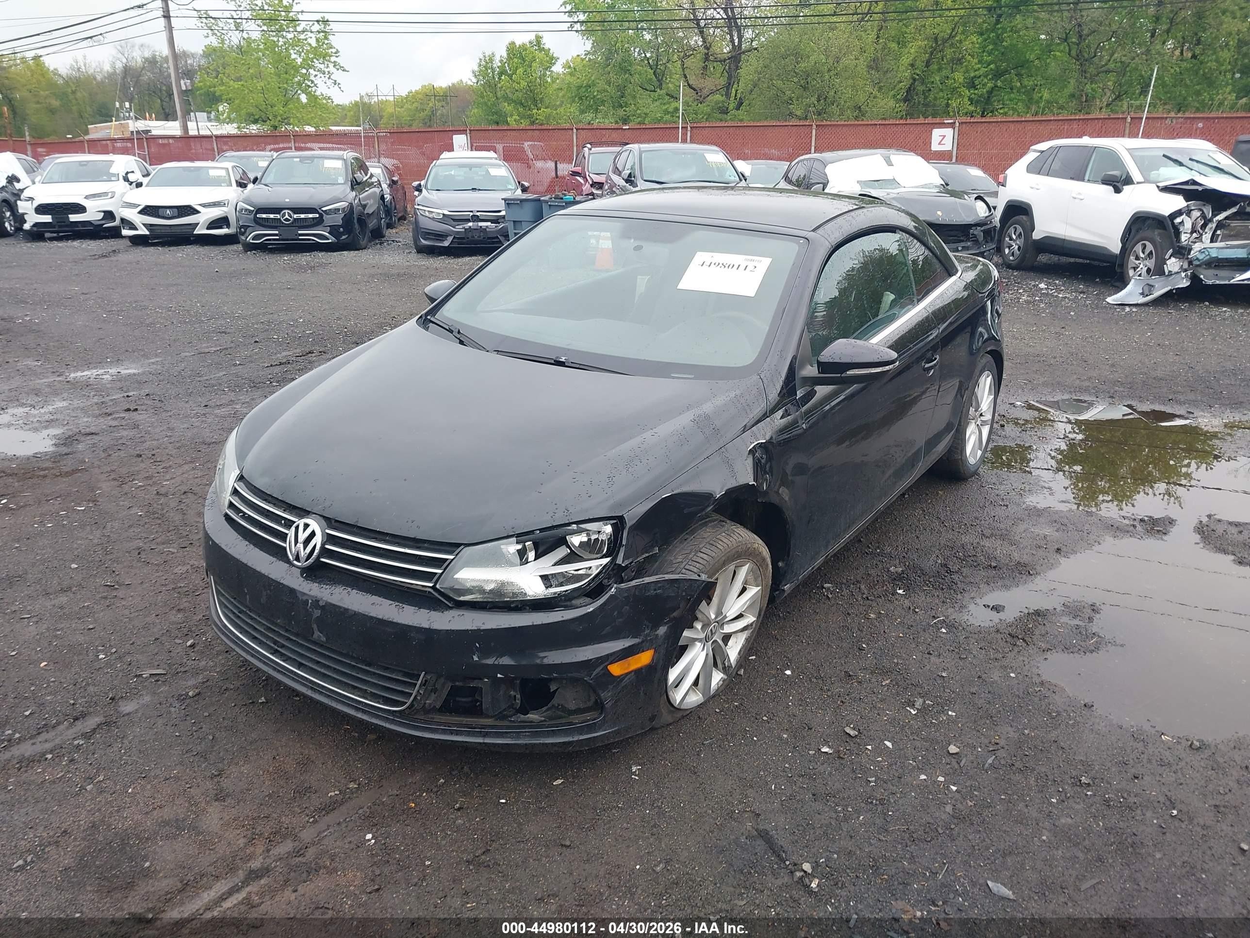 2013 Volkswagen Eos Komfort Черный vin: WVWBW8AH3DV009049