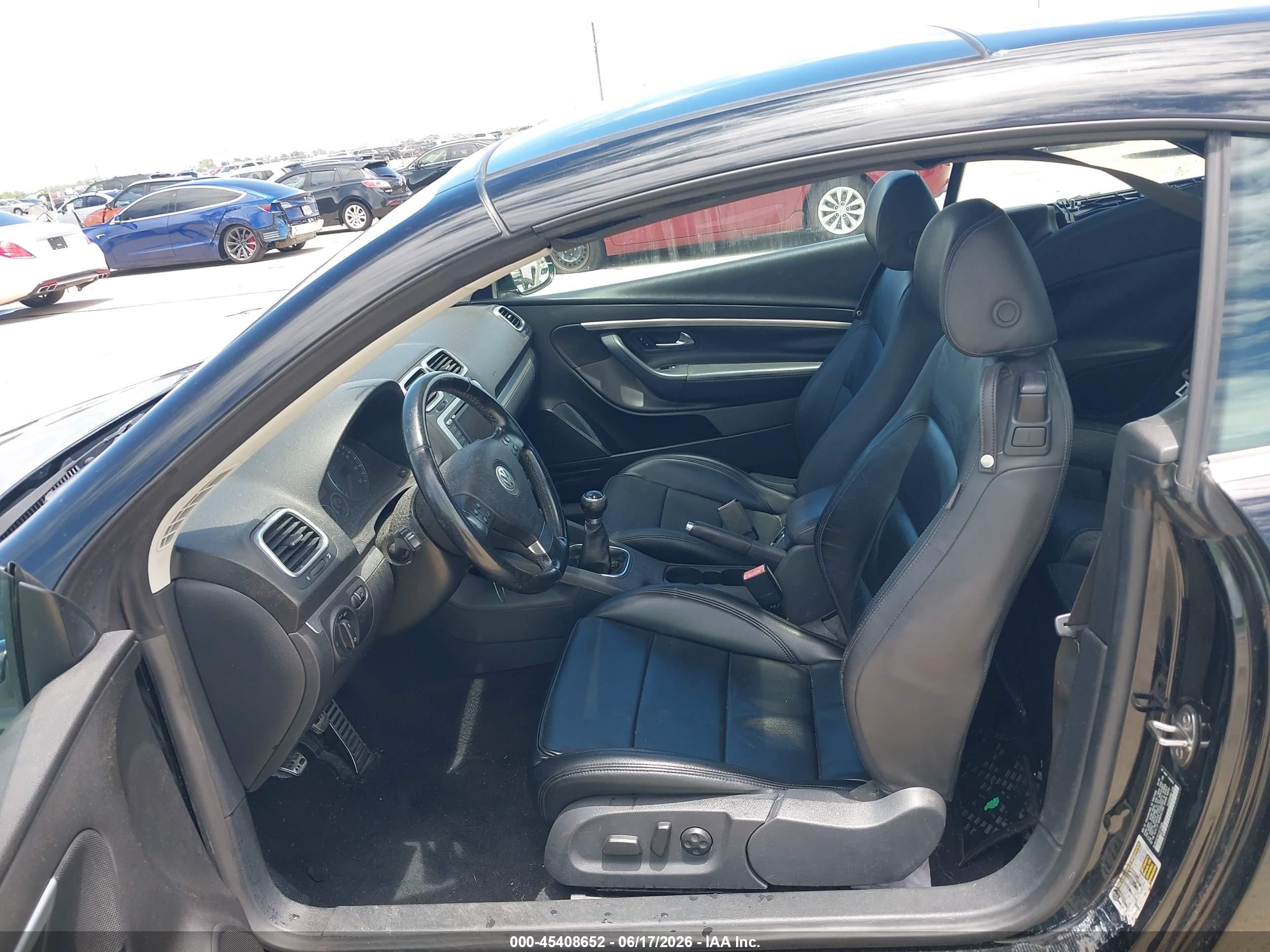 2007 Volkswagen Eos 2.0t Черный vin: WVWCA71F17V040039