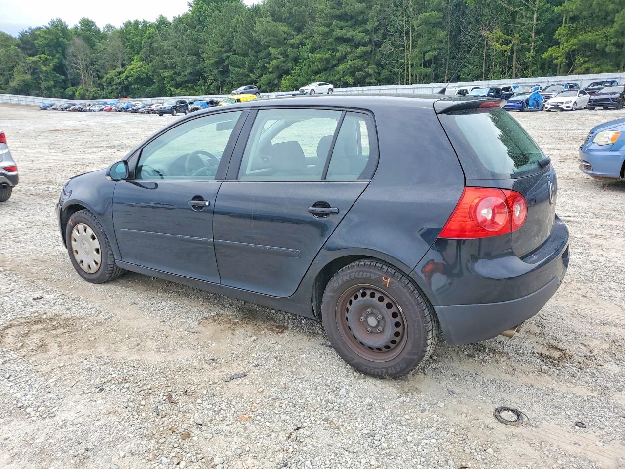 2009 Volkswagen Rabbit Black vin: WVWDA71K79W080012