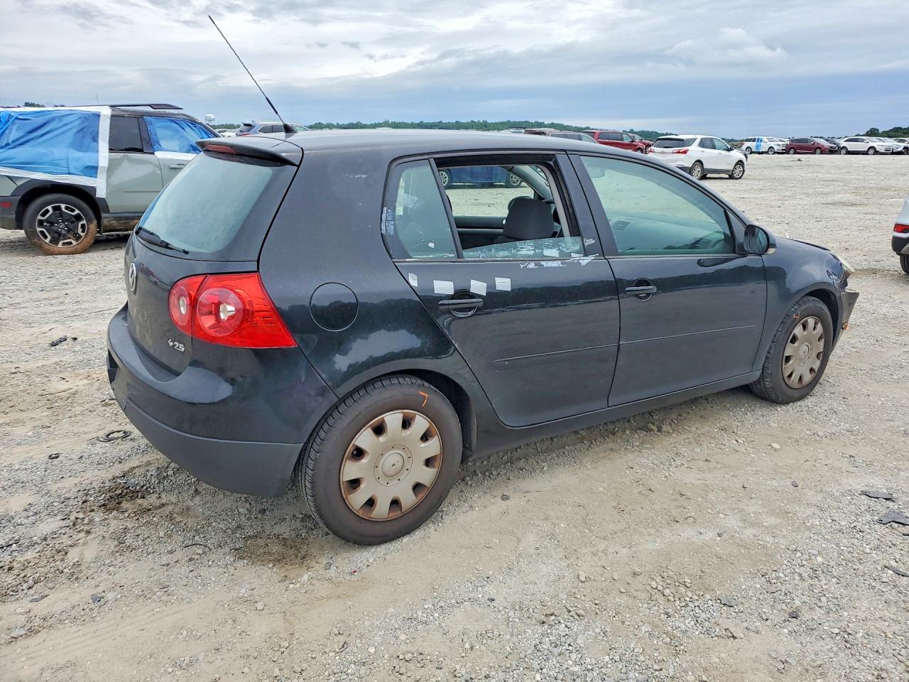 2009 Volkswagen Rabbit Black vin: WVWDA71K79W080012