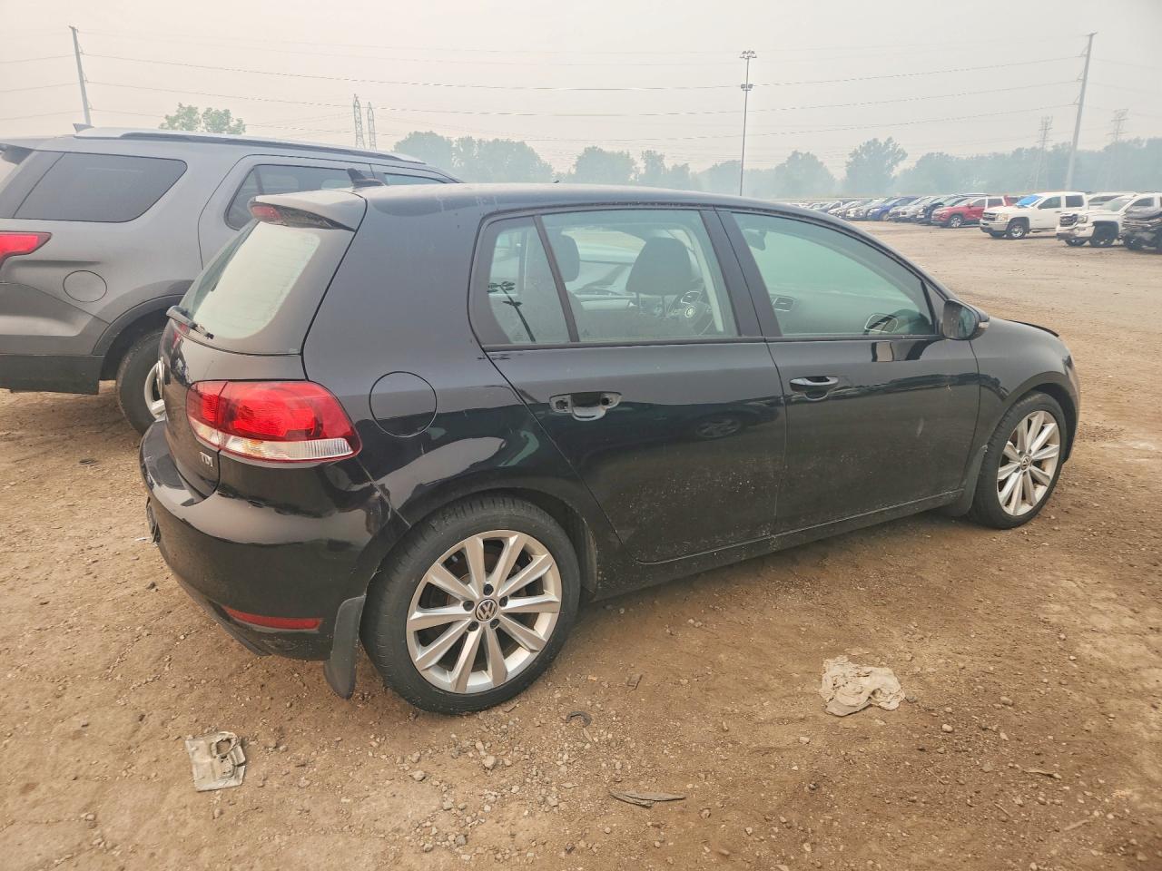 2013 Volkswagen Golf Black vin: WVWDM7AJ3DW128886