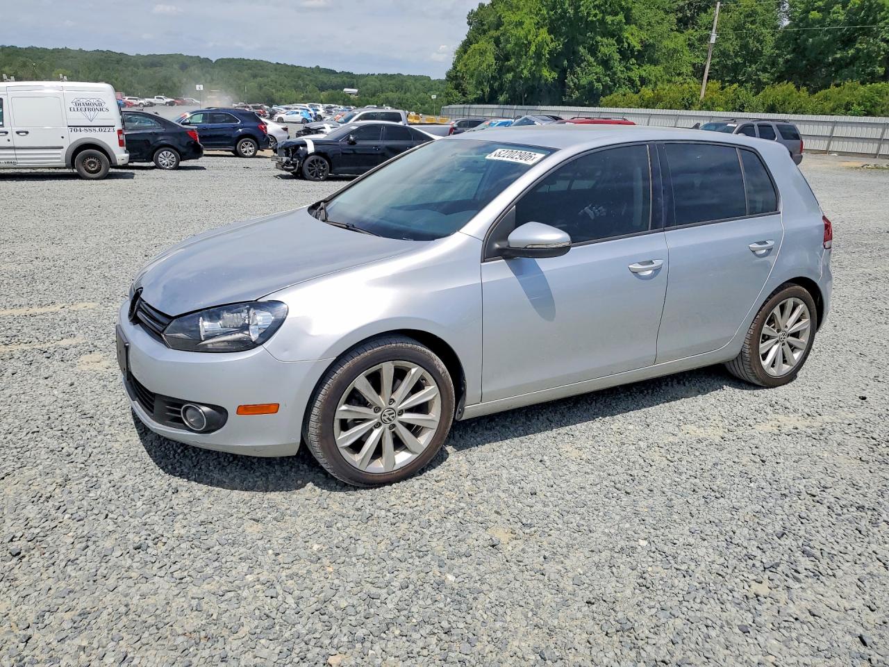 2014 Volkswagen Golf Серебряный vin: WVWDM7AJ3EW003095