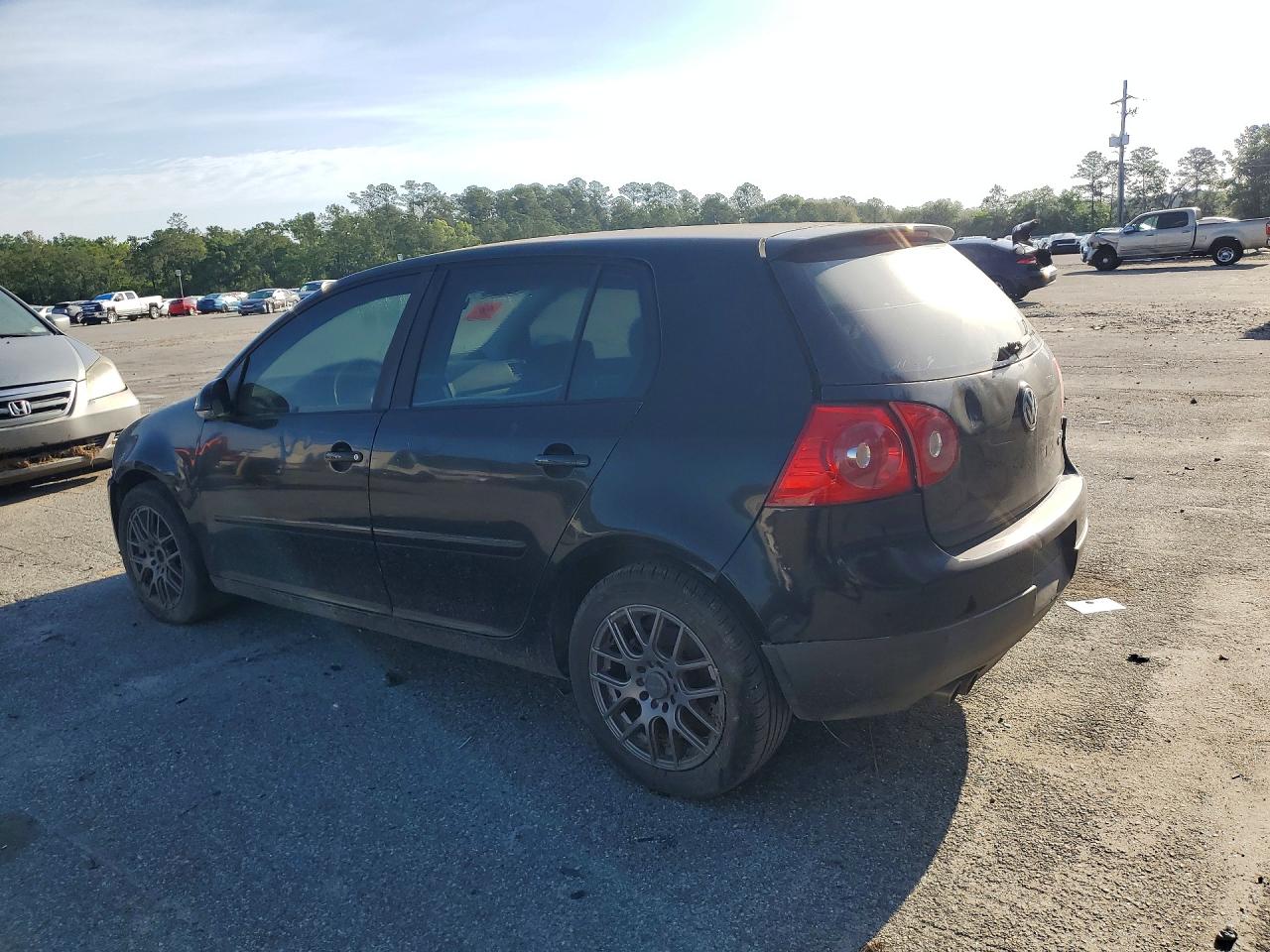 2006 Volkswagen Rabbit Черный vin: WVWDR71K26W138029