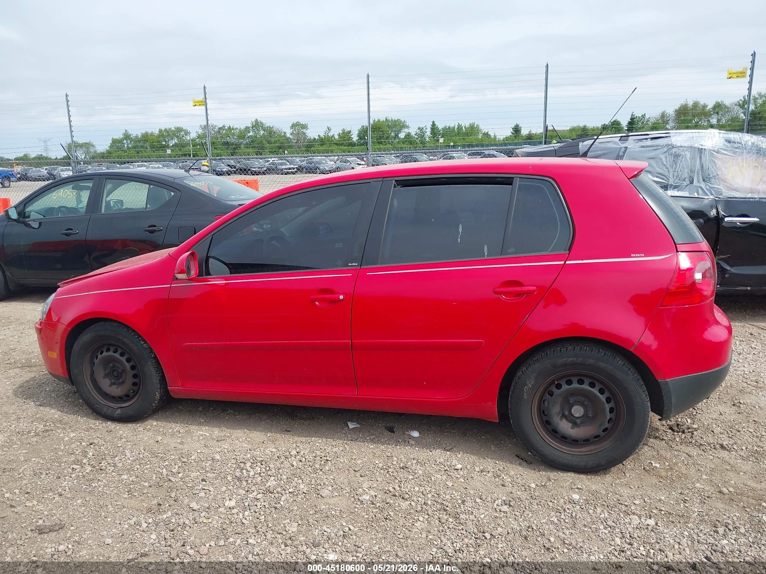 2007 Volkswagen Rabbit 4-door Red vin: WVWDR71K57W173455