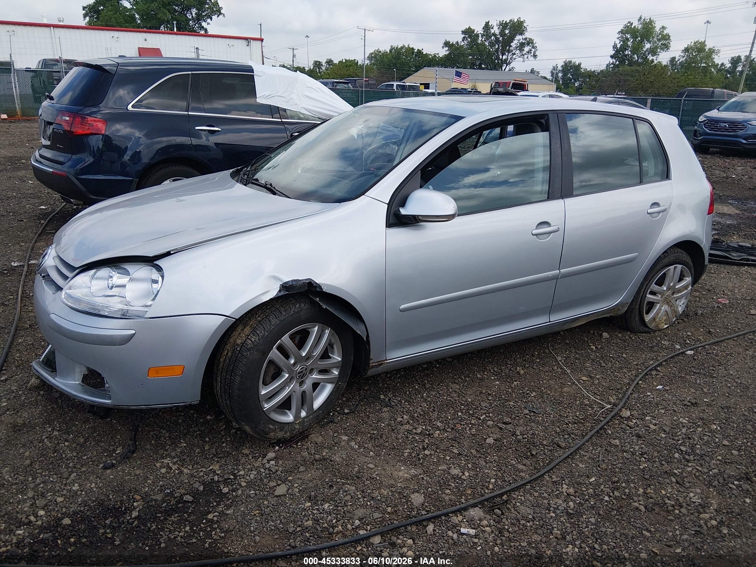 2007 Volkswagen Rabbit 4-door (a6) Серебряный vin: WVWDR71K67W059903