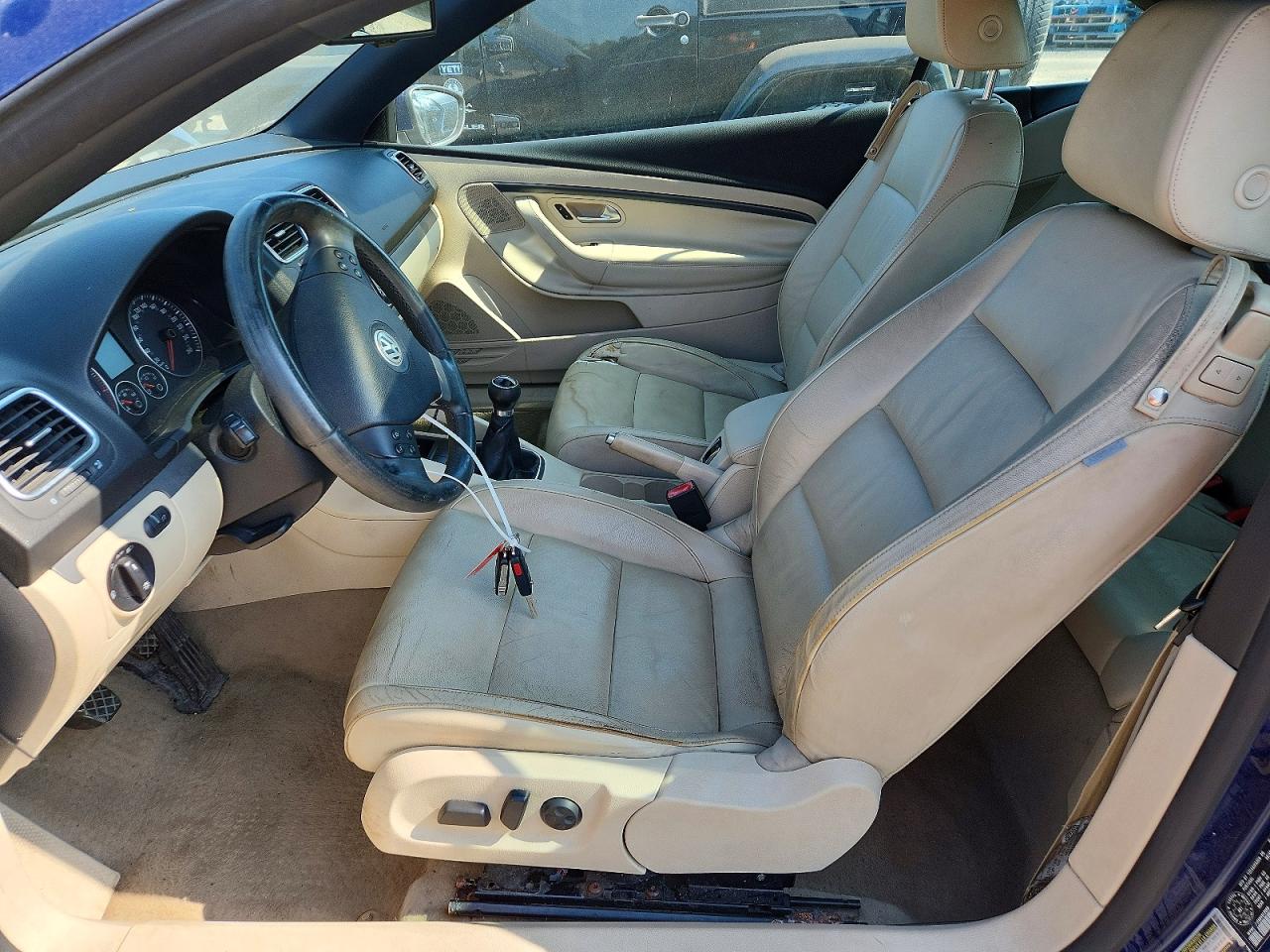 2009 Volkswagen Eos Lux Blue vin: WVWEA71F59V012059