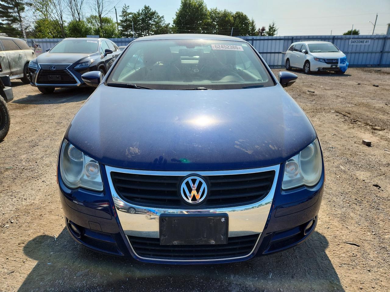 2009 Volkswagen Eos Lux Blue vin: WVWEA71F59V012059