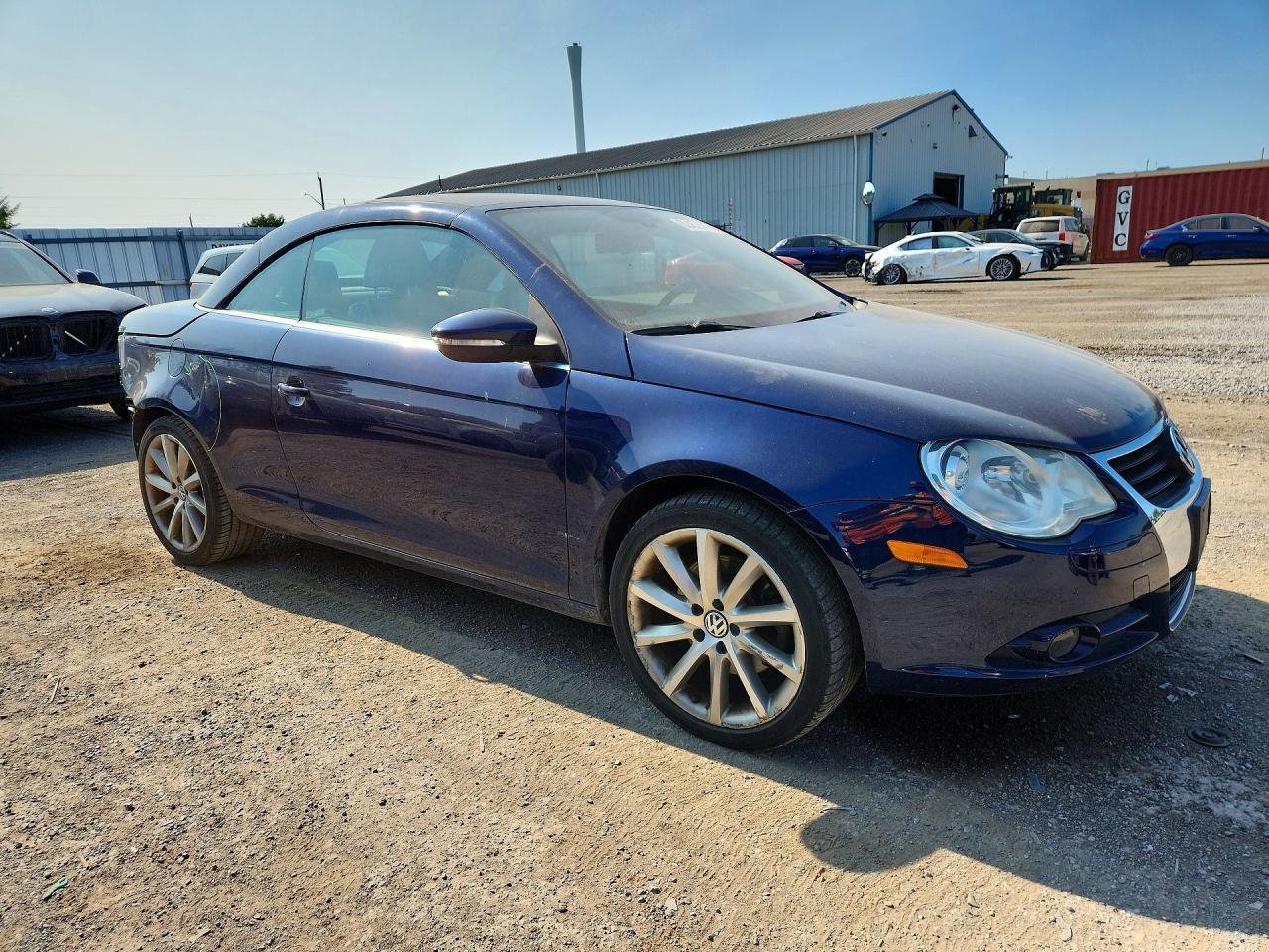 2009 Volkswagen Eos Lux Blue vin: WVWEA71F59V012059