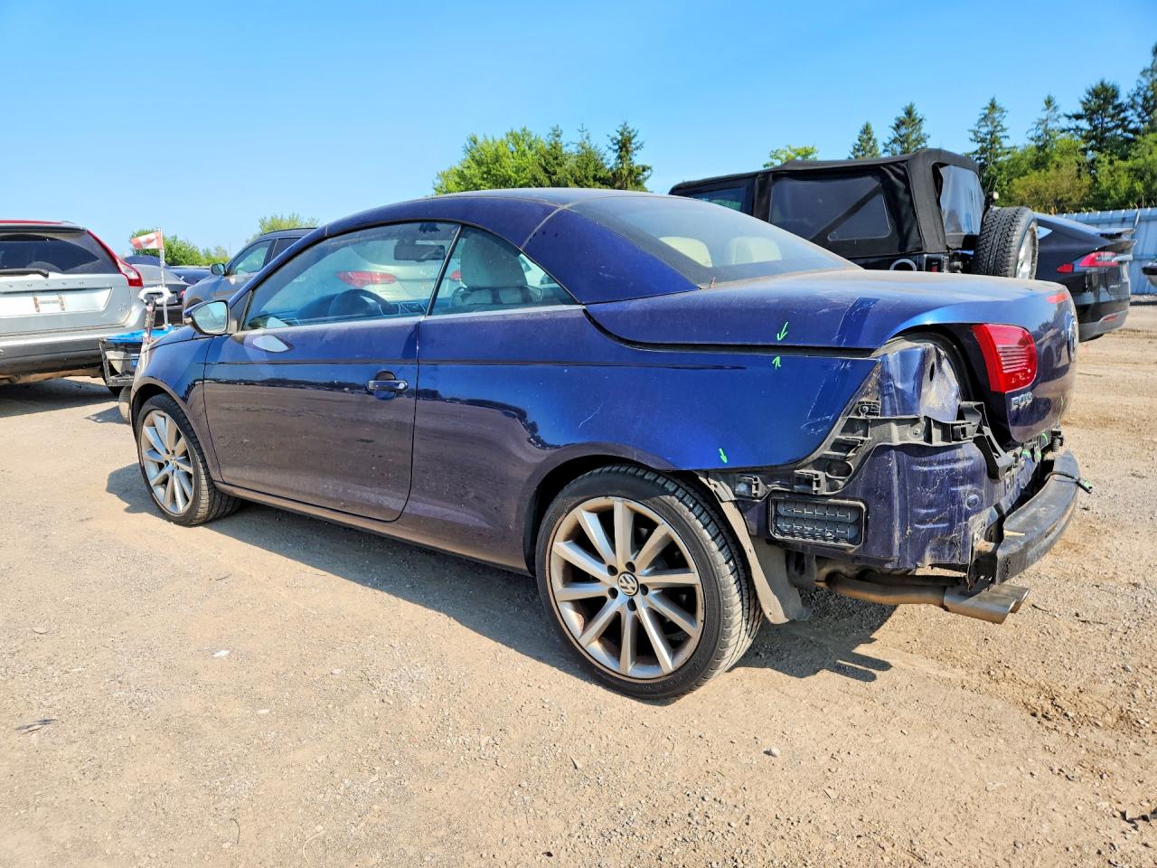 2009 Volkswagen Eos Lux Blue vin: WVWEA71F59V012059