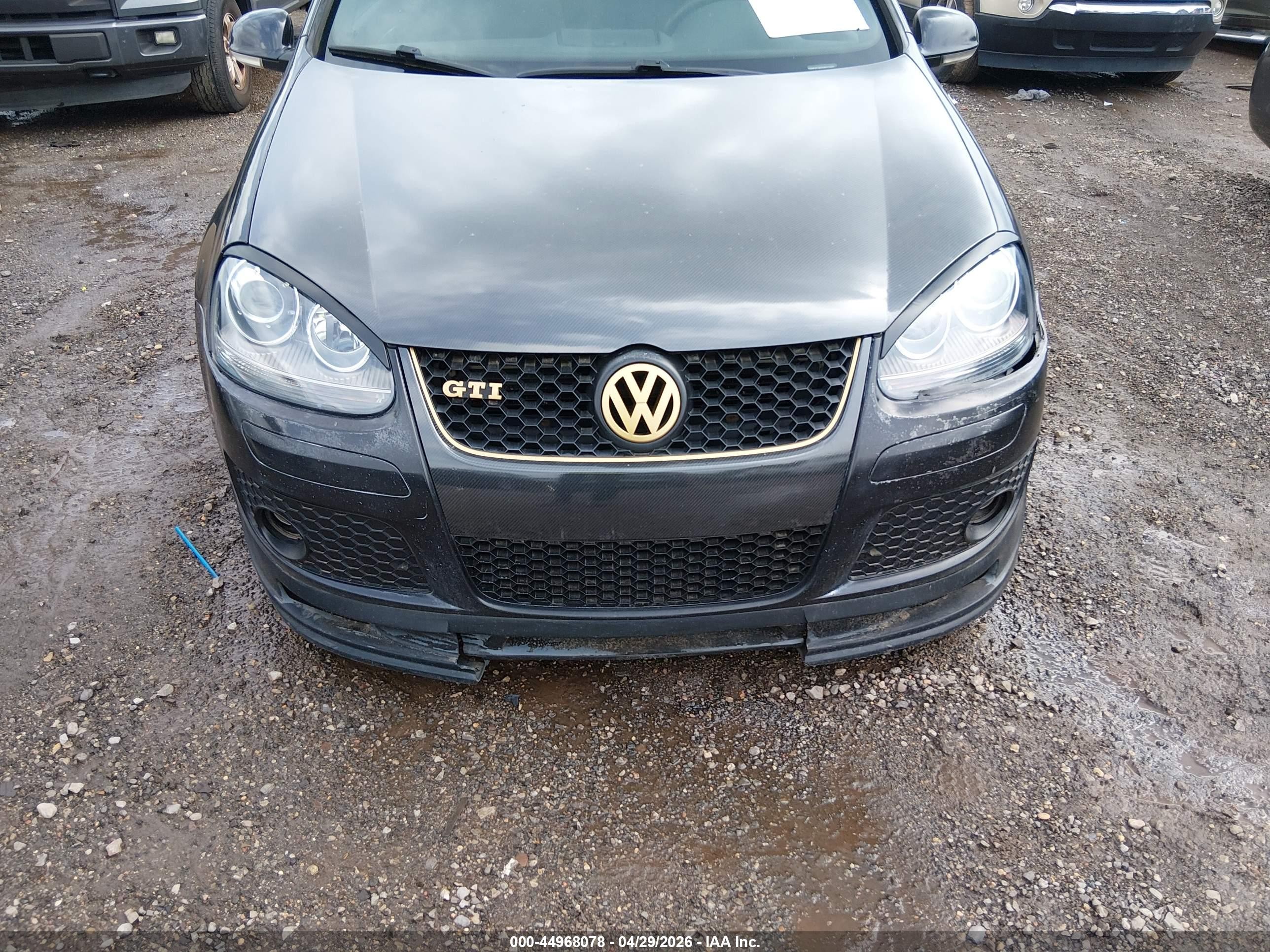 2009 Volkswagen Gti 2-door Черный vin: WVWEV71K59W022490