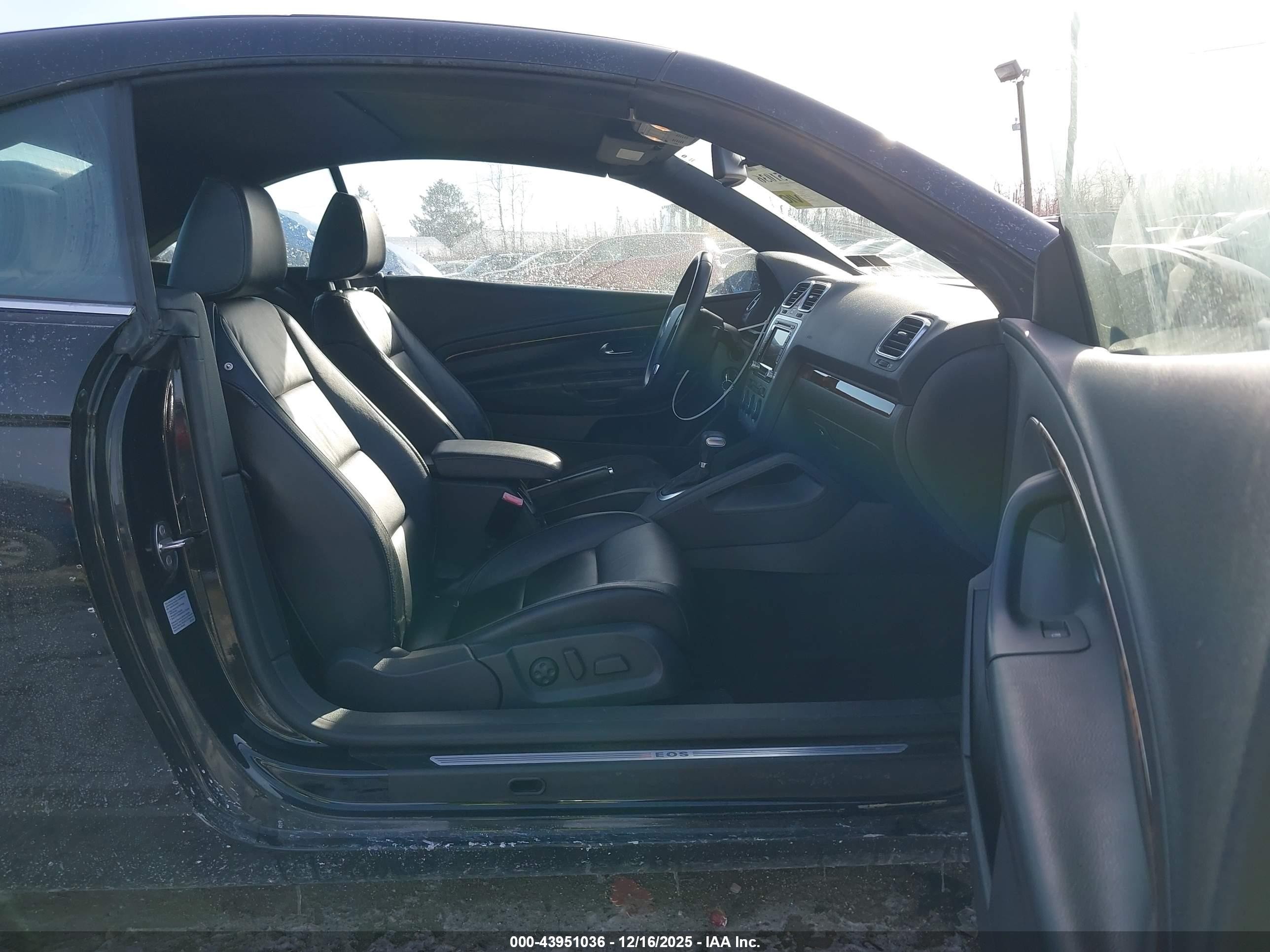 2009 Volkswagen Eos Lux Черный vin: WVWFA71F19V018333