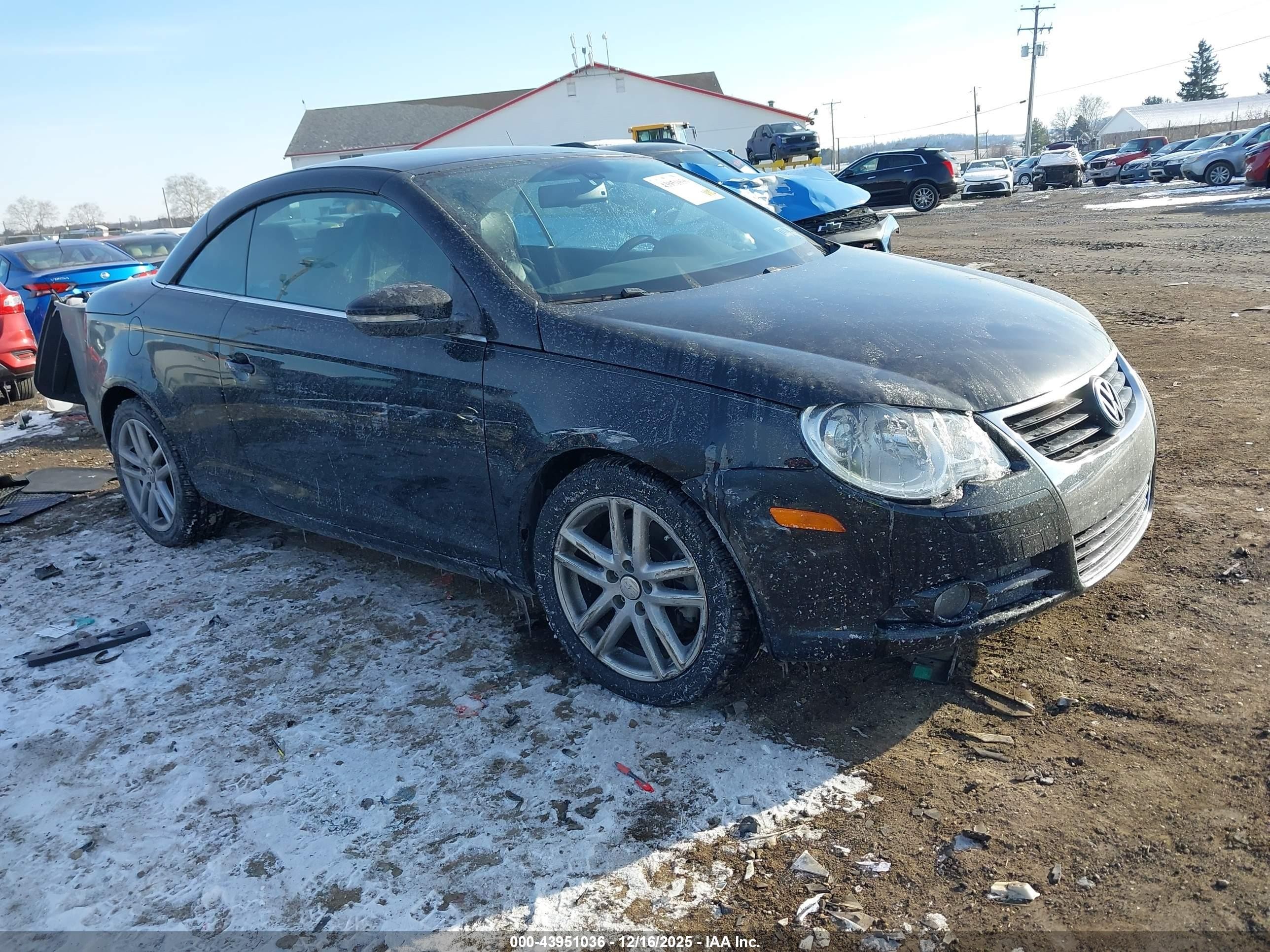 2009 Volkswagen Eos Lux Черный vin: WVWFA71F19V018333