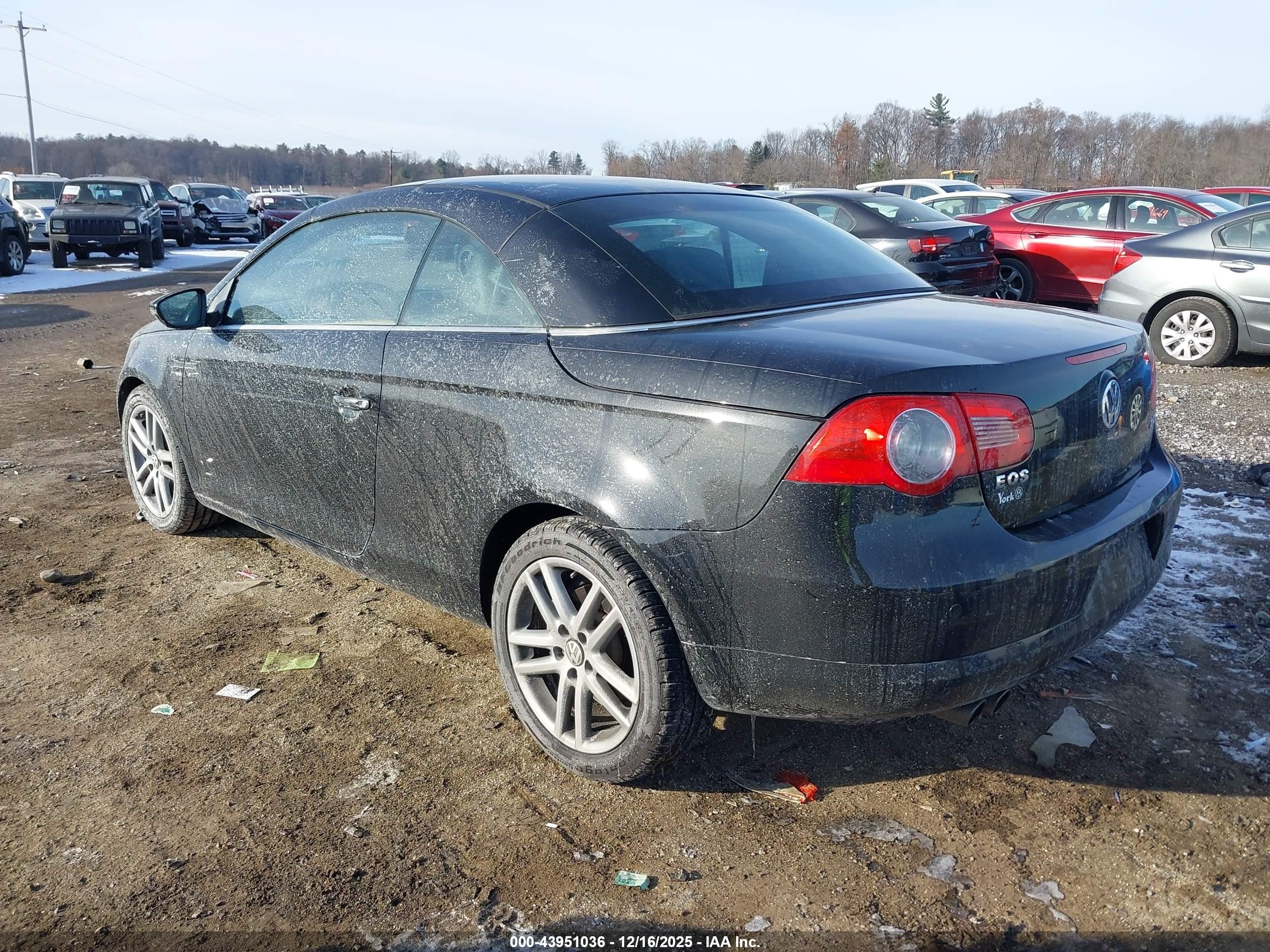 2009 Volkswagen Eos Lux Черный vin: WVWFA71F19V018333