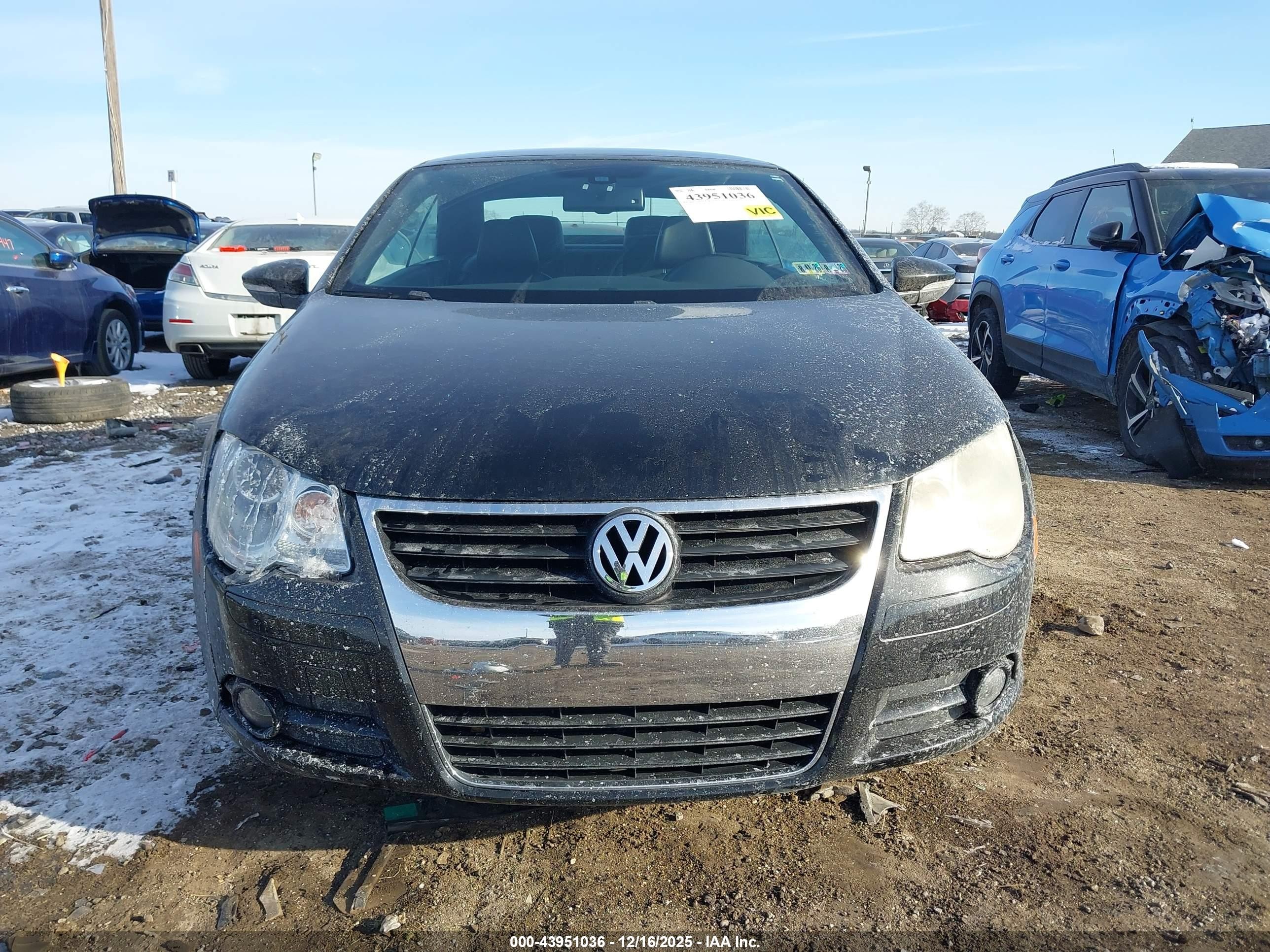 2009 Volkswagen Eos Lux Черный vin: WVWFA71F19V018333