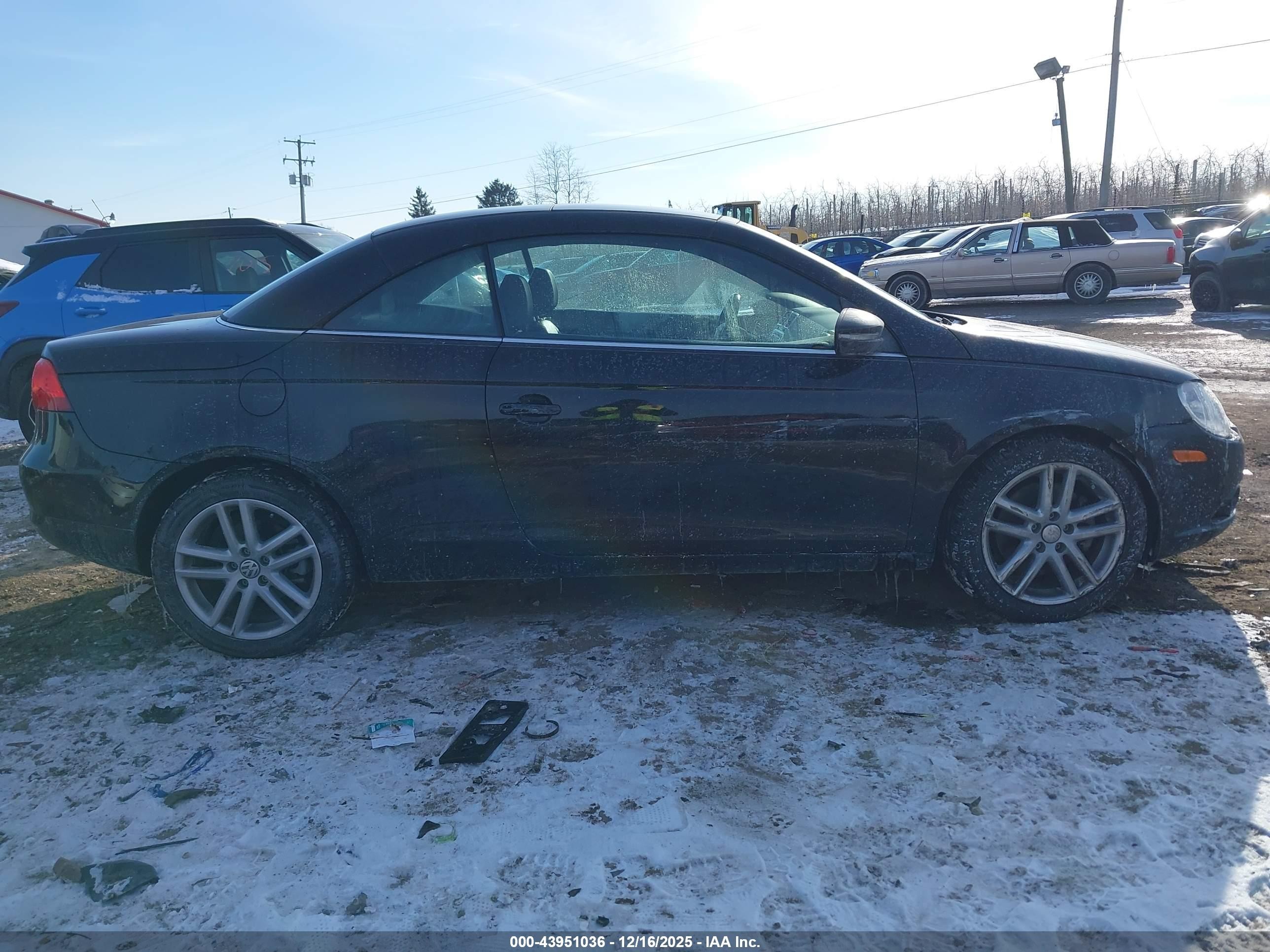 2009 Volkswagen Eos Lux Черный vin: WVWFA71F19V018333