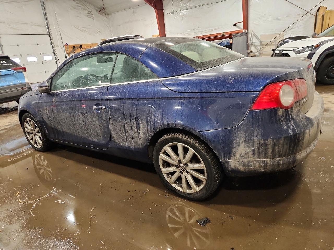 2009 Volkswagen Eos Lux Blue vin: WVWFA71F69V024483