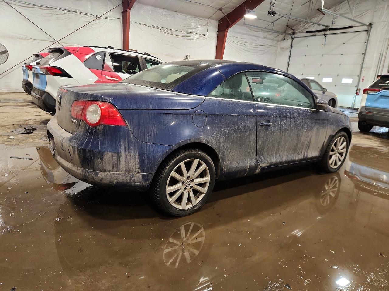 2009 Volkswagen Eos Lux Blue vin: WVWFA71F69V024483